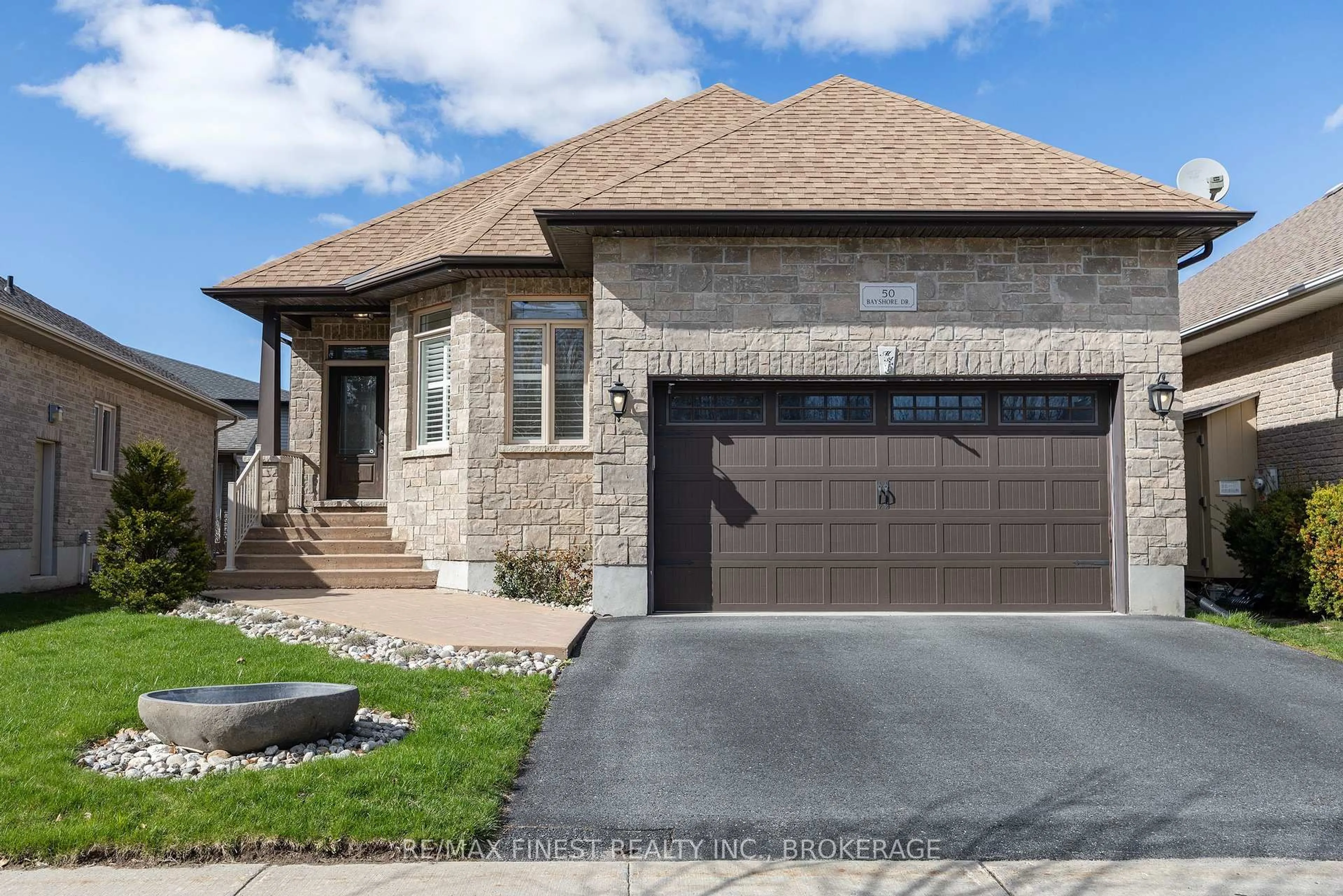 Home with brick exterior material, street for 50 Bayshore Dr, Bath Ontario K0H 1G0