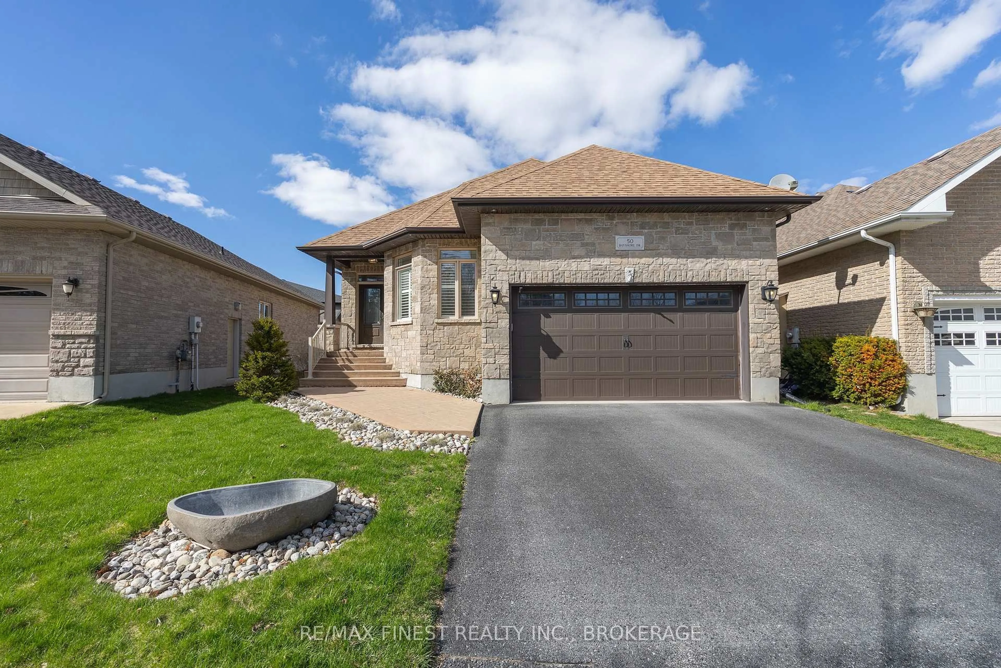 A pic from outside/outdoor area/front of a property/back of a property/a pic from drone, street for 50 Bayshore Dr, Bath Ontario K0H 1G0