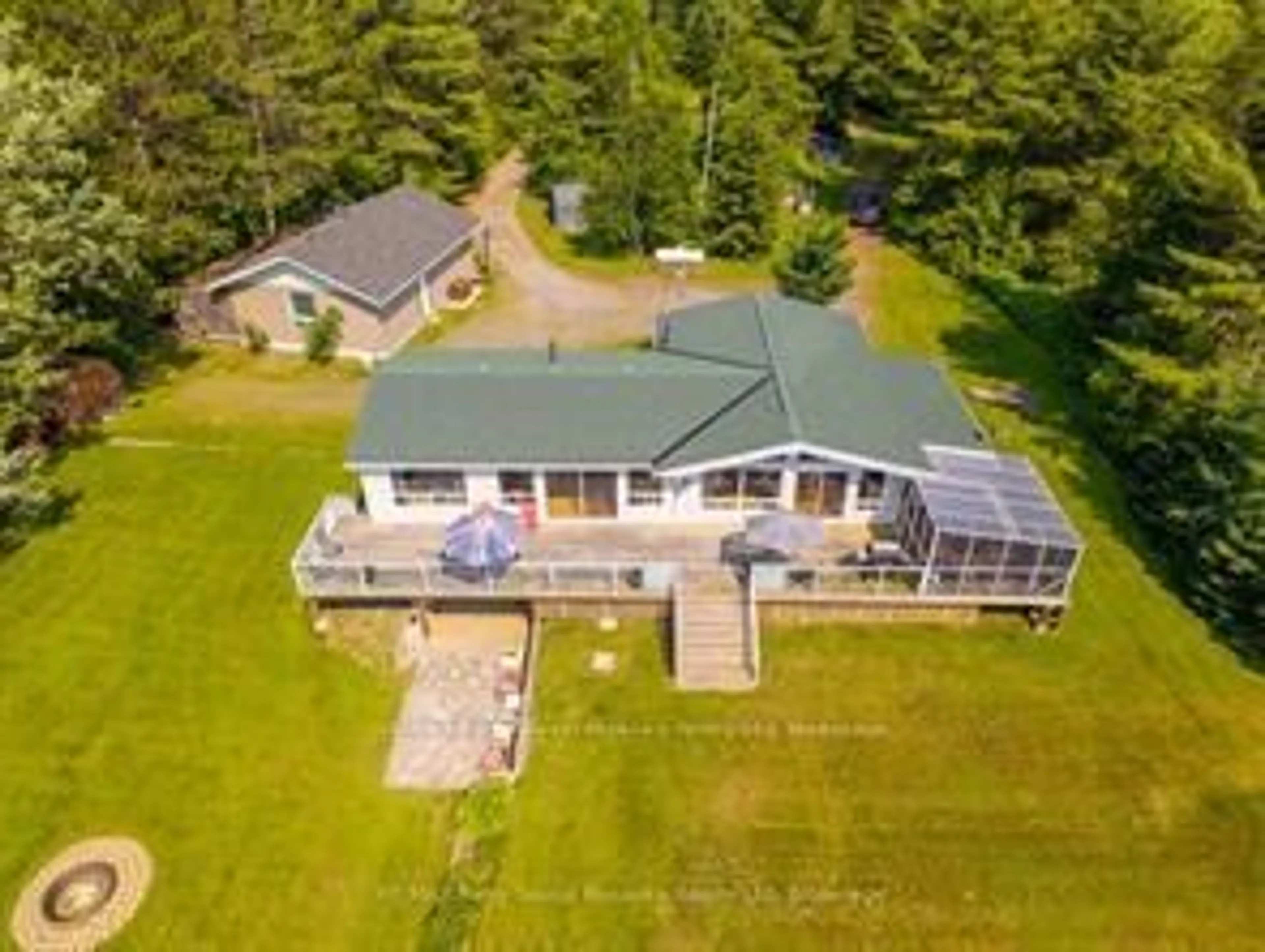 A pic from outside/outdoor area/front of a property/back of a property/a pic from drone, water/lake/river/ocean view for 97 Gibson Bay Rd, Whitestone Ontario P0A 1G0