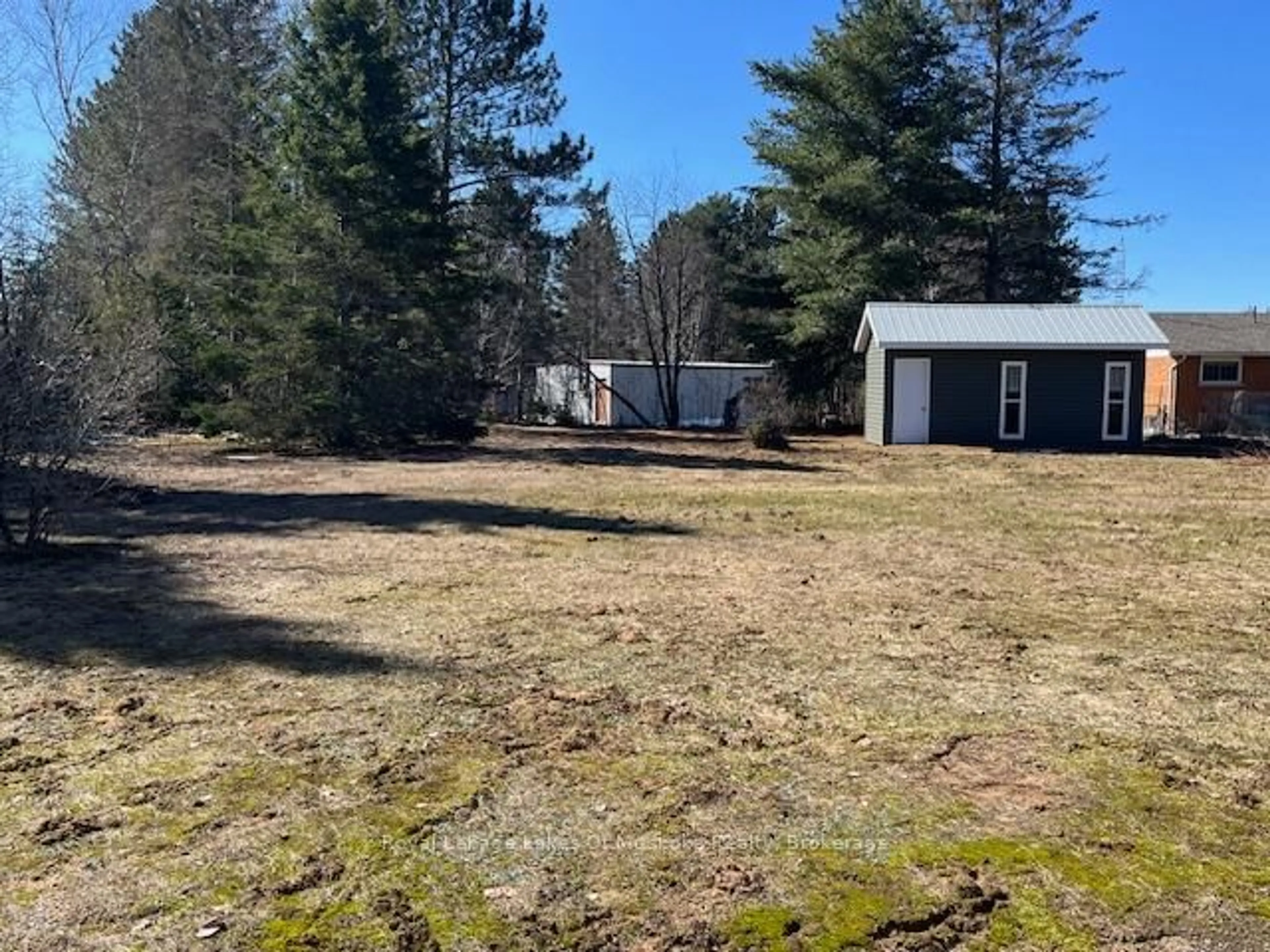 A pic from outside/outdoor area/front of a property/back of a property/a pic from drone, forest/trees view for 161 Forest Lake Rd, Strong Ontario P0A 1Z0