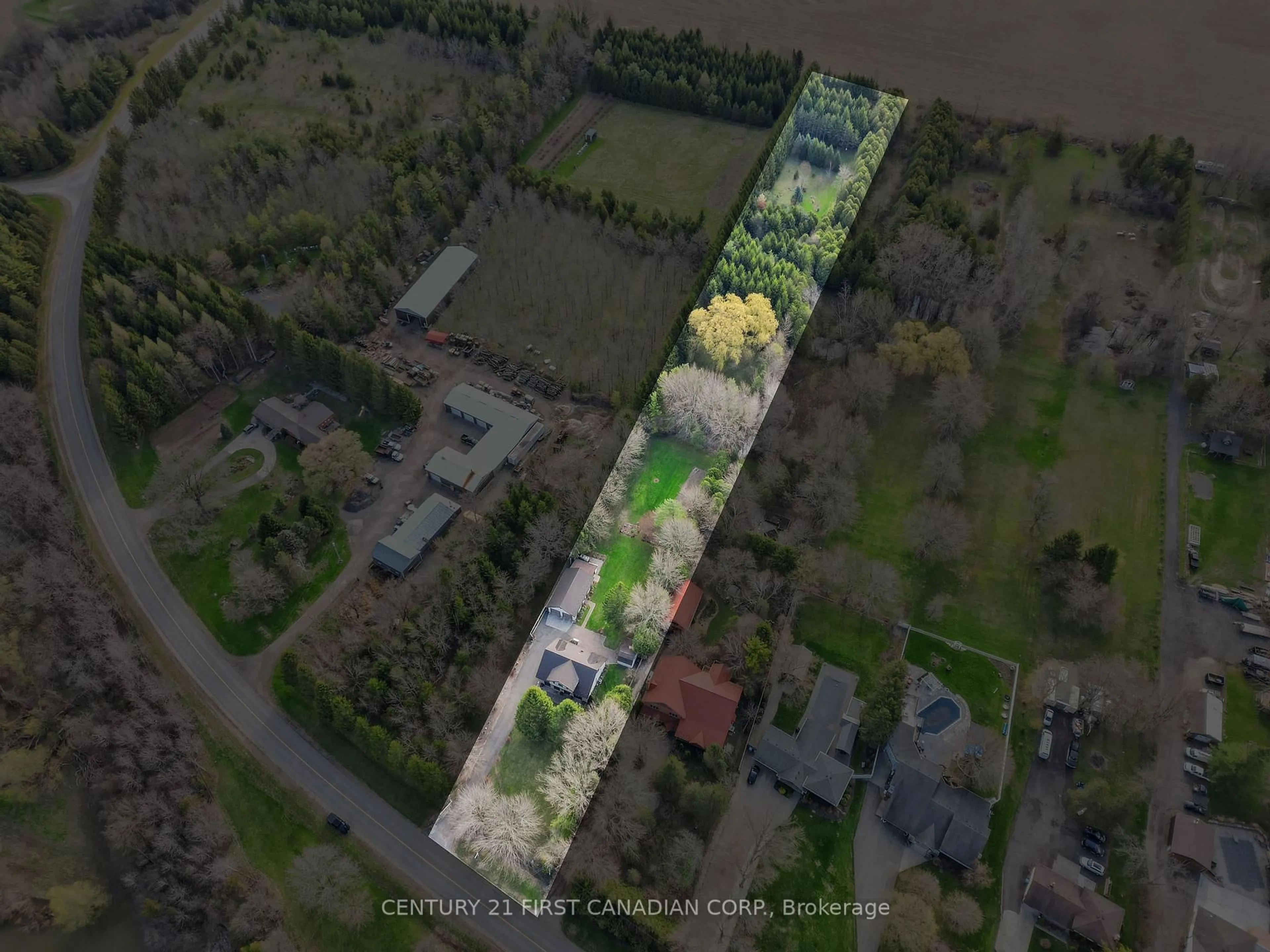 A pic from outside/outdoor area/front of a property/back of a property/a pic from drone, unknown for 33396 Queen St, North Middlesex Ontario N0M 1A0