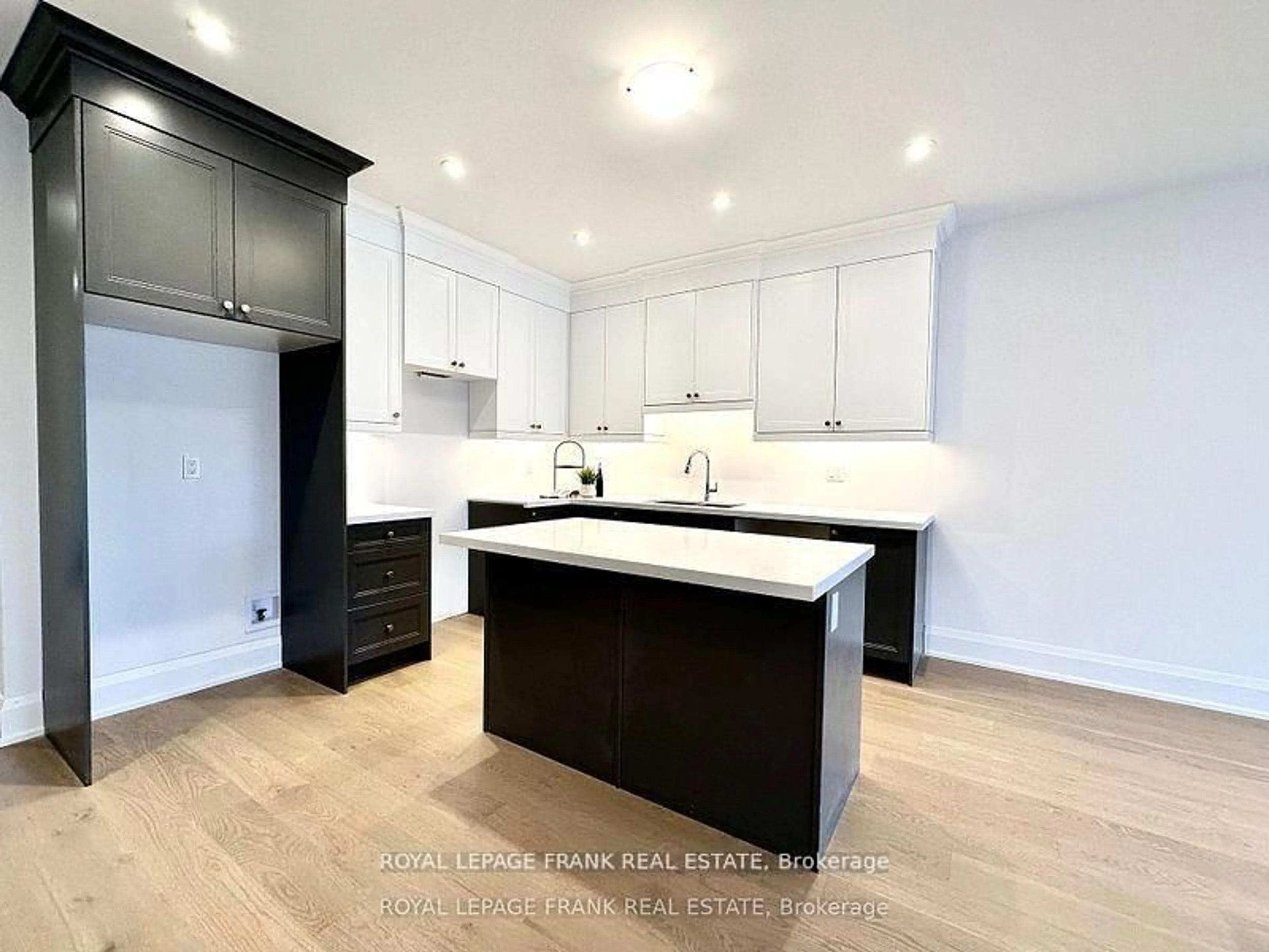 Open concept kitchen, wood/laminate floor for 34 Pond St, Trent Hills Ontario K0L 1Y0