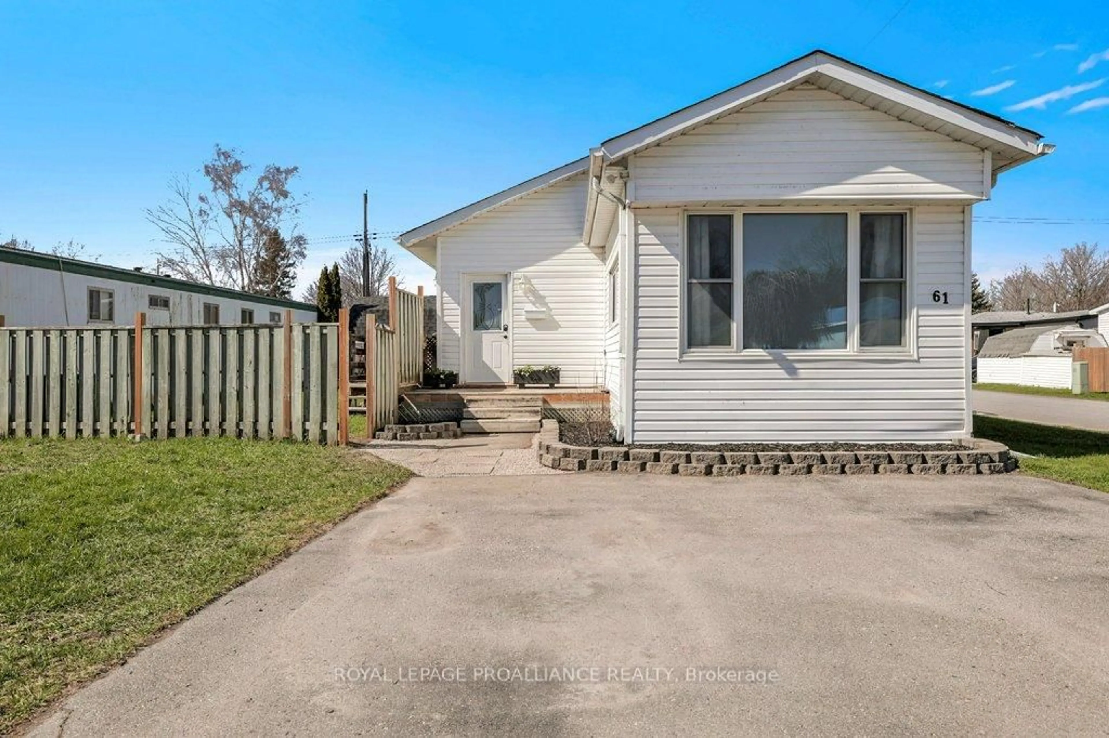 A pic from outside/outdoor area/front of a property/back of a property/a pic from drone, street for 529 Old Highway 2 #61, Quinte West Ontario K8V 5P5