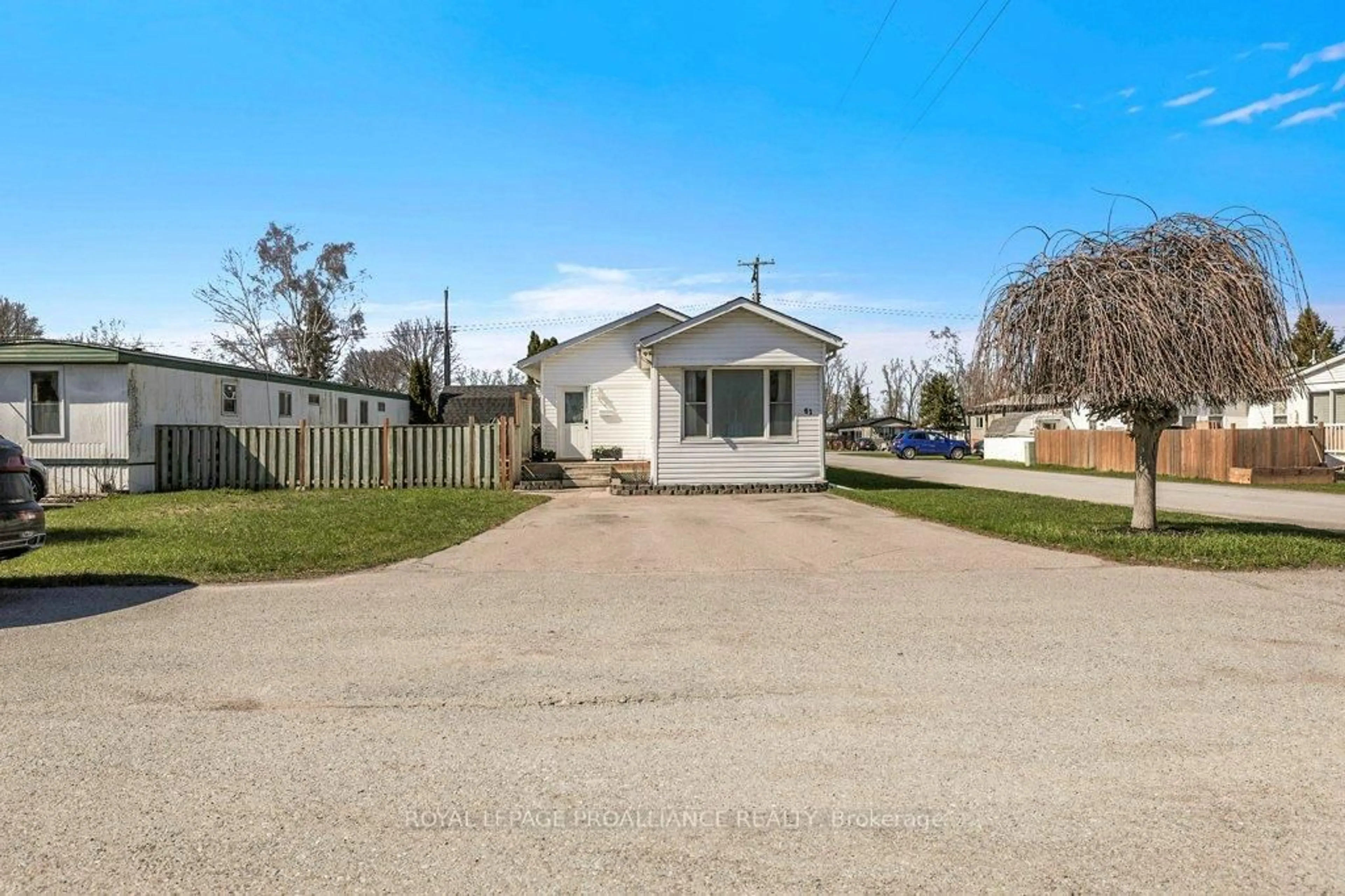 A pic from outside/outdoor area/front of a property/back of a property/a pic from drone, street for 529 Old Highway 2 #61, Quinte West Ontario K8V 5P5