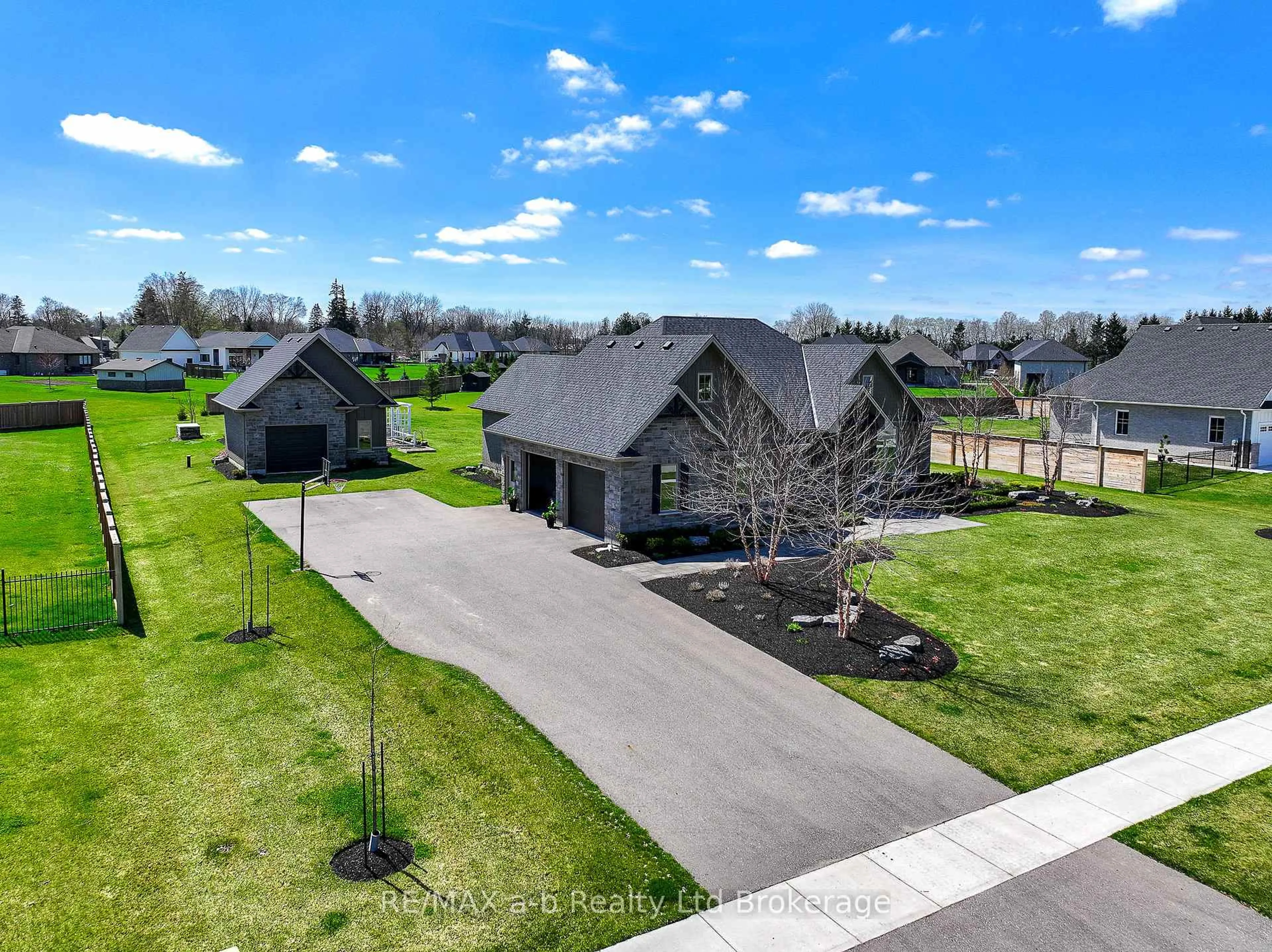 A pic from outside/outdoor area/front of a property/back of a property/a pic from drone, street for 60 August Cres, Norwich Ontario N0J 1R0