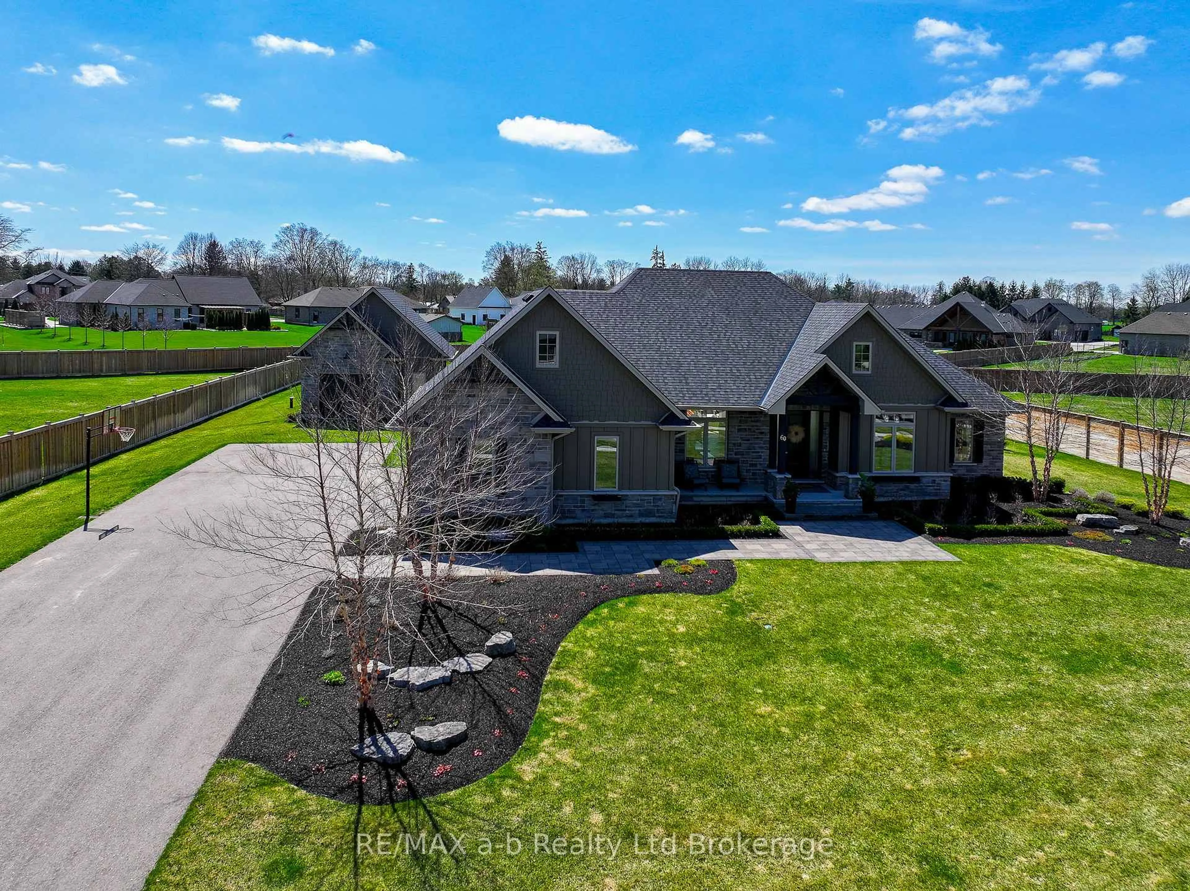 A pic from outside/outdoor area/front of a property/back of a property/a pic from drone, unknown for 60 August Cres, Norwich Ontario N0J 1R0