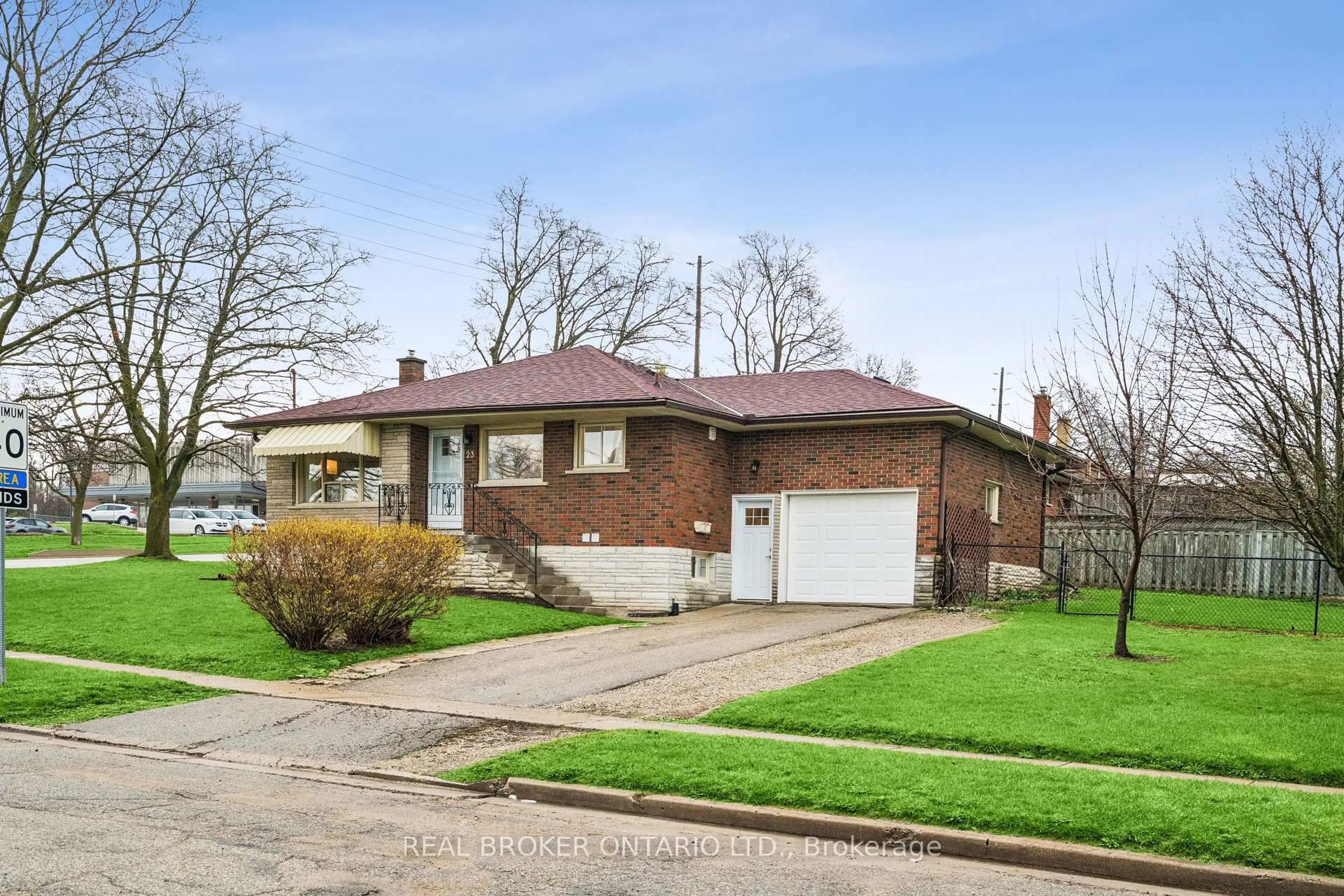 Home with brick exterior material, street for 23 Knightswood Blvd, Guelph Ontario N1E 3W3