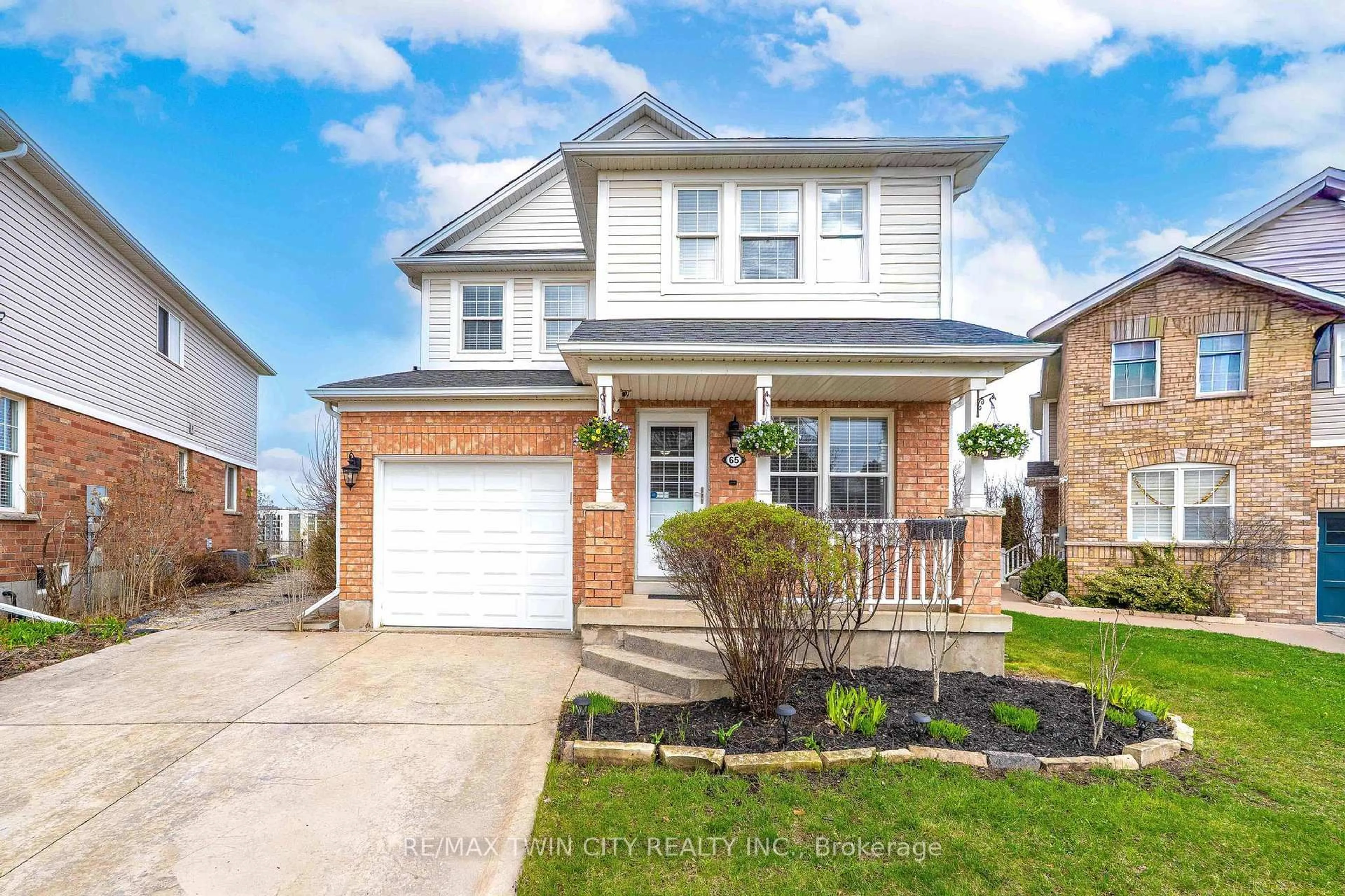 Home with brick exterior material, street for 65 Bloomington Dr, Cambridge Ontario N1P 1J5