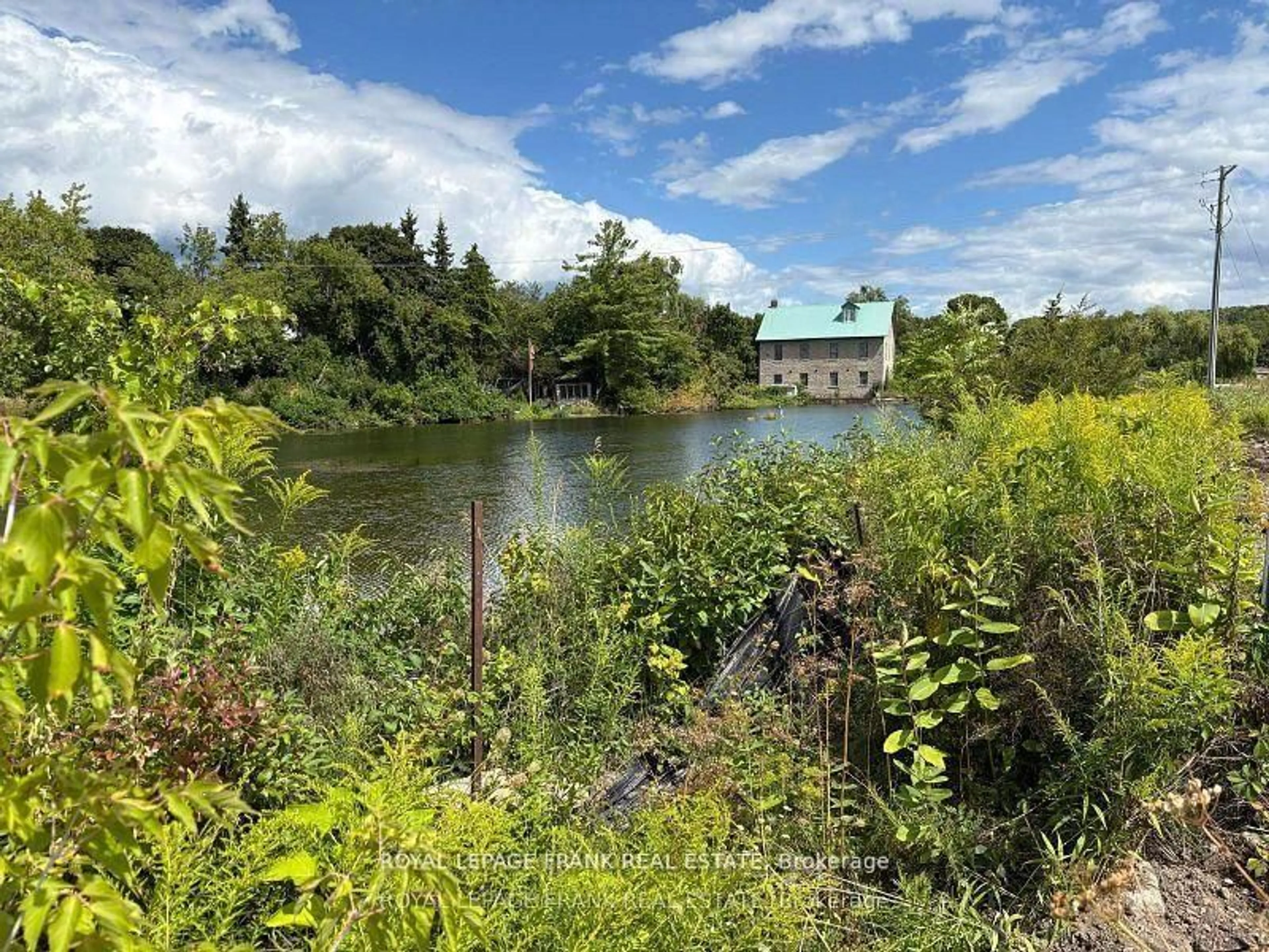 A pic from outside/outdoor area/front of a property/back of a property/a pic from drone, water/lake/river/ocean view for 9 Pond St, Trent Hills Ontario K0L 1Y0