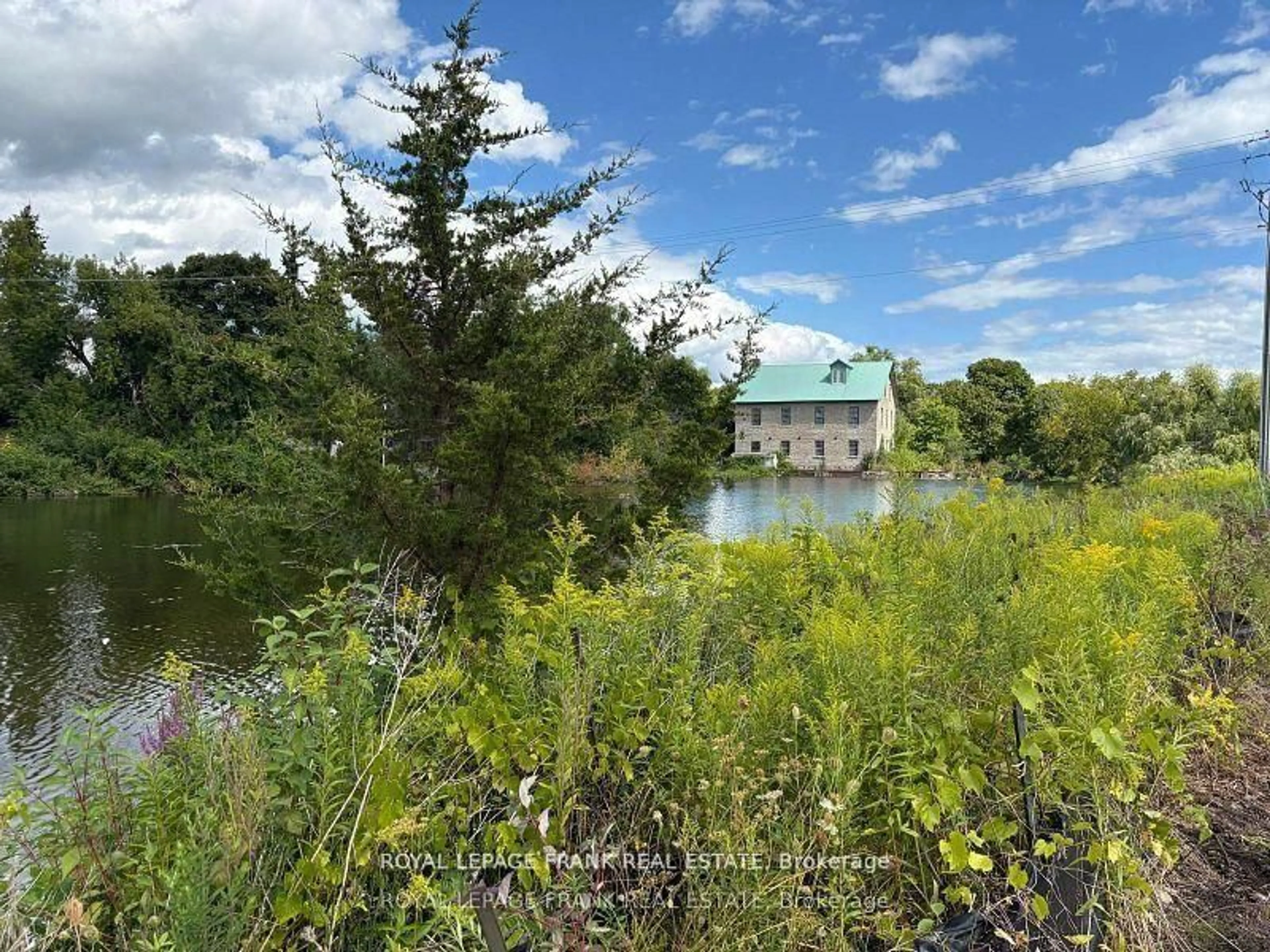 A pic from outside/outdoor area/front of a property/back of a property/a pic from drone, water/lake/river/ocean view for 3 Pond St, Trent Hills Ontario K0L 1Y0