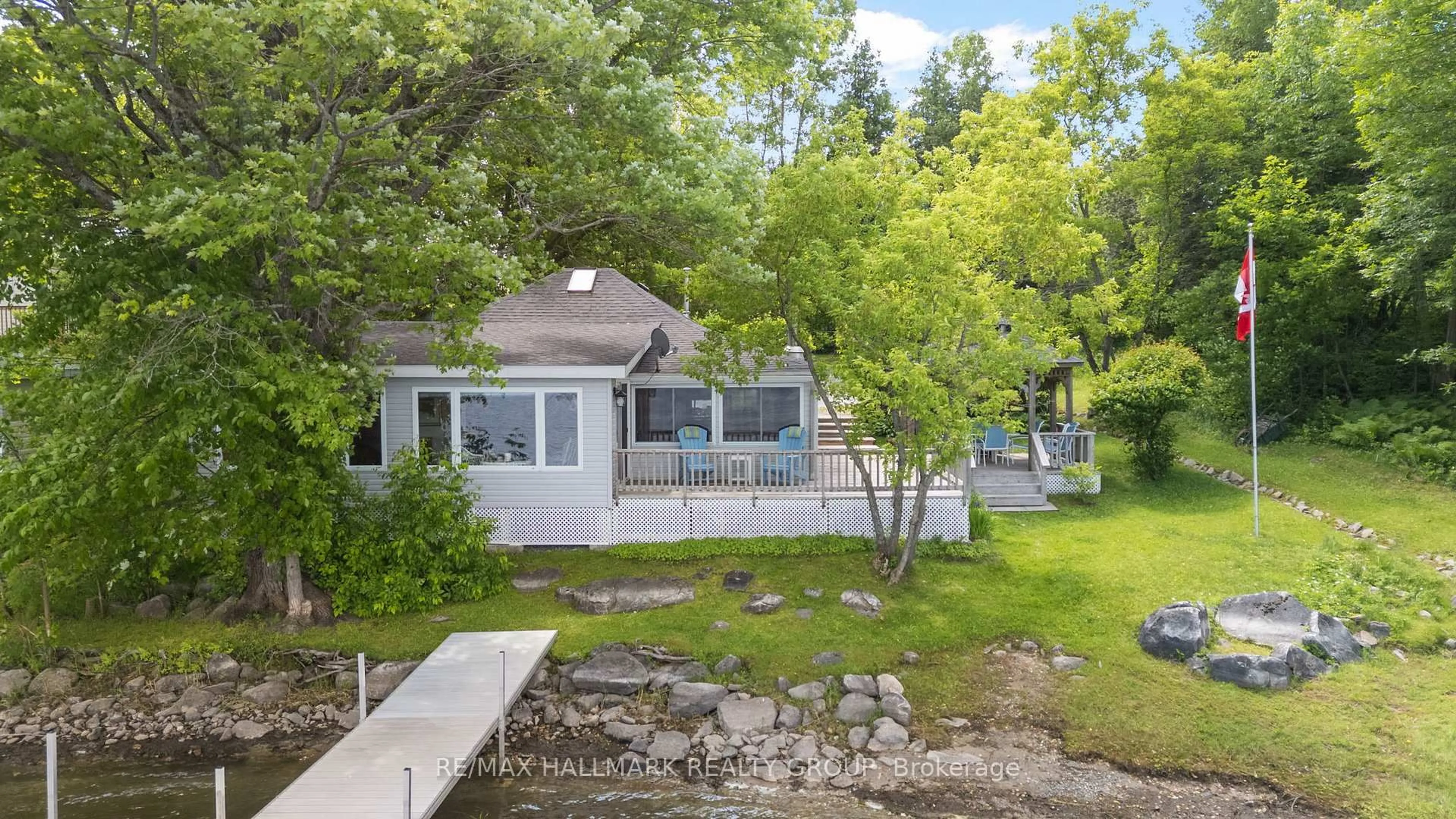 A pic from outside/outdoor area/front of a property/back of a property/a pic from drone, water/lake/river/ocean view for 118 Hall Shore Rd, Mcdonalds Corners Ontario K0G 1M0
