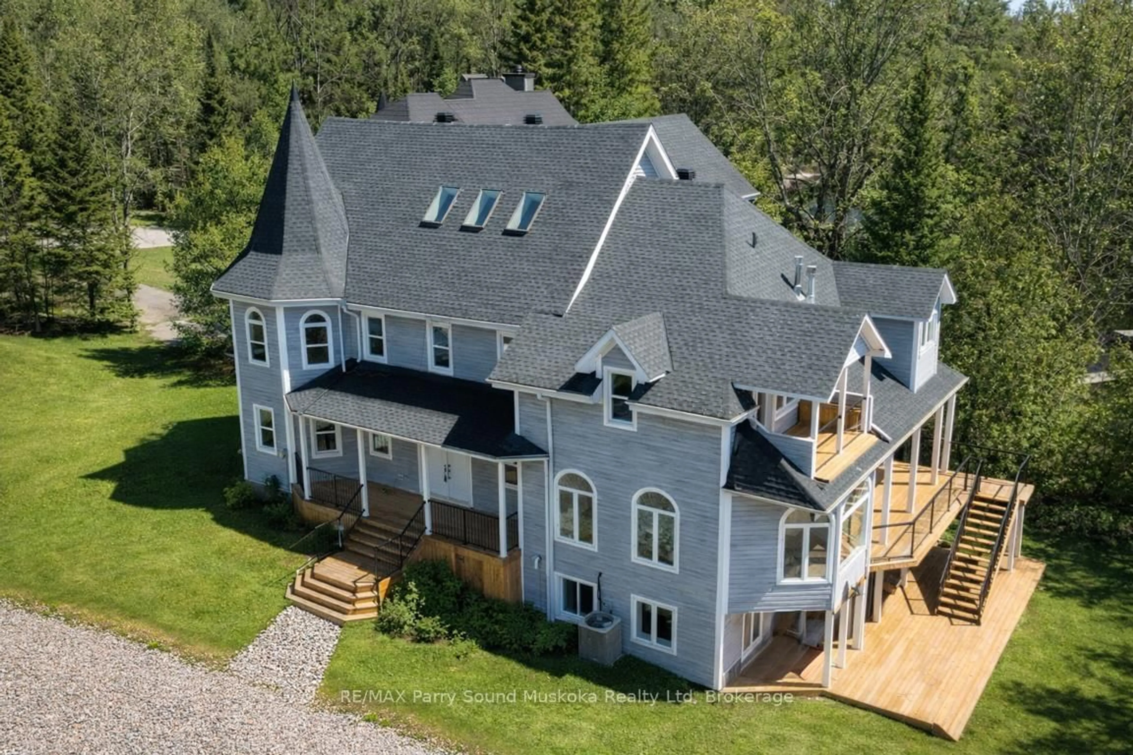 A pic from outside/outdoor area/front of a property/back of a property/a pic from drone, mountain view for 14-16 KNOWLES Cres, Seguin Ontario P0C 1J0