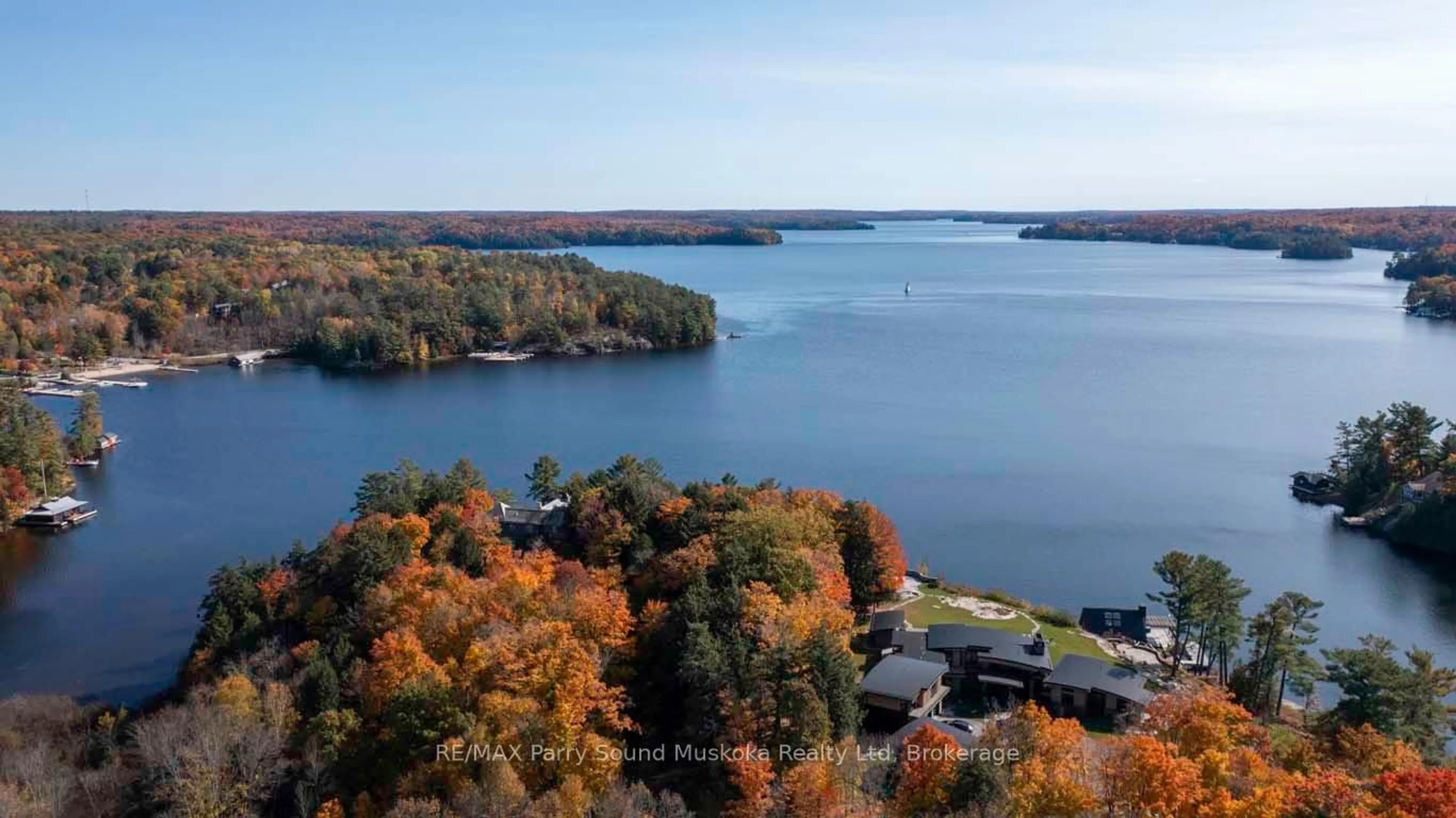 A pic from outside/outdoor area/front of a property/back of a property/a pic from drone, water/lake/river/ocean view for 14-16 KNOWLES Cres, Seguin Ontario P0C 1J0