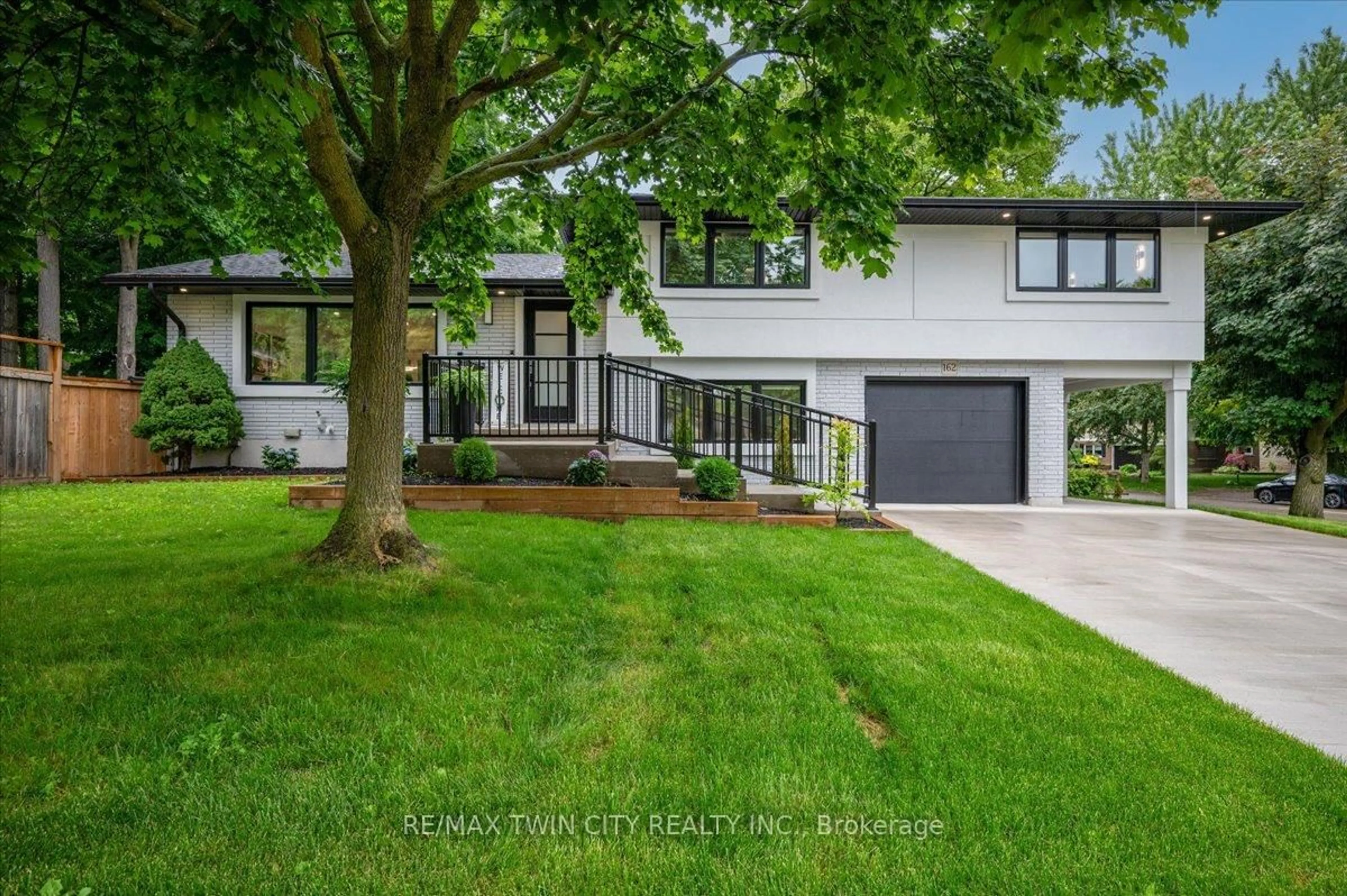 Home with vinyl exterior material, street for 162 Greenbrook Dr, Kitchener Ontario N2M 4J7