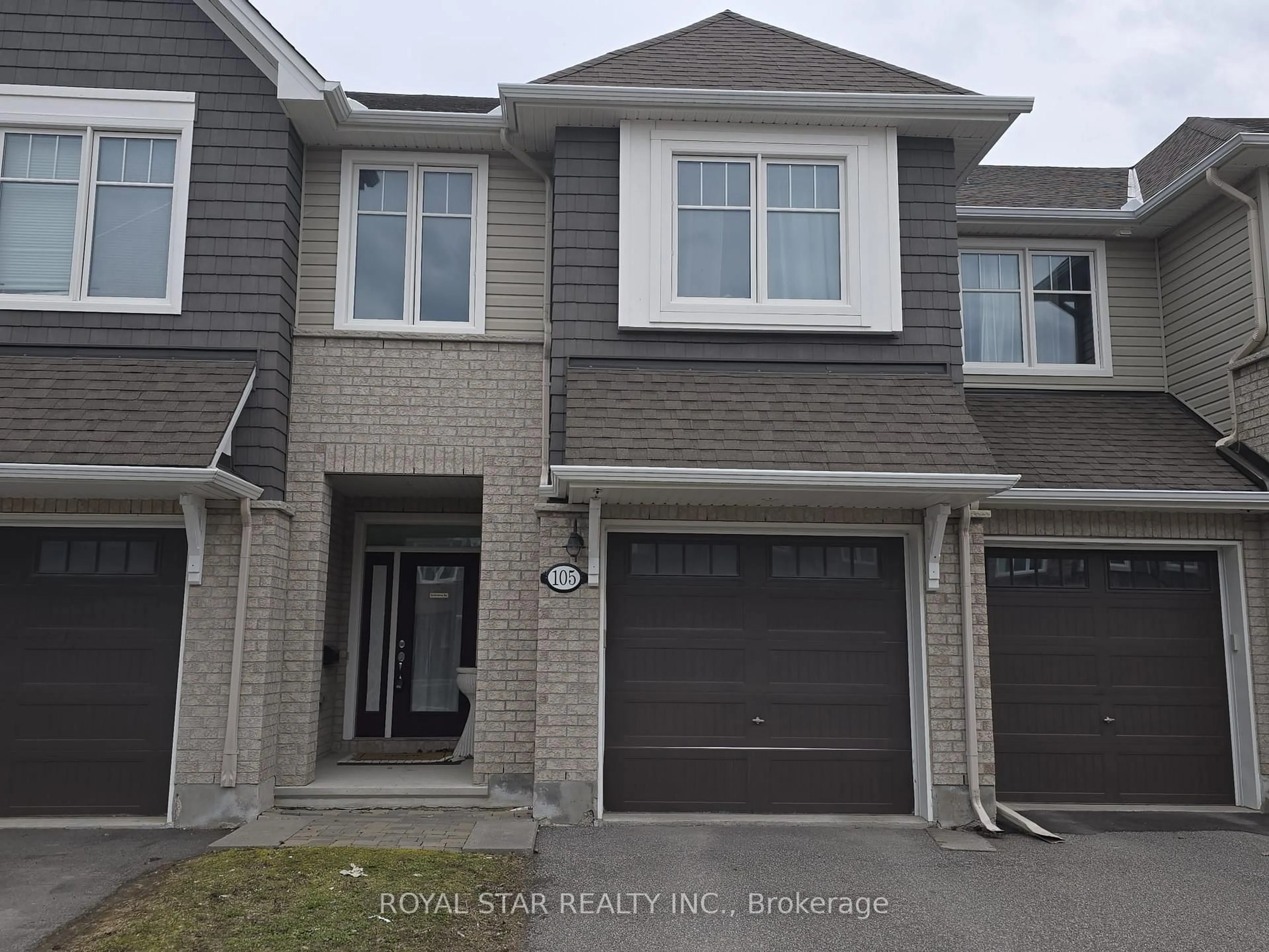 Home with brick exterior material, street for 105 Eric Maloney Way, Ottawa Ontario K1T 0R2