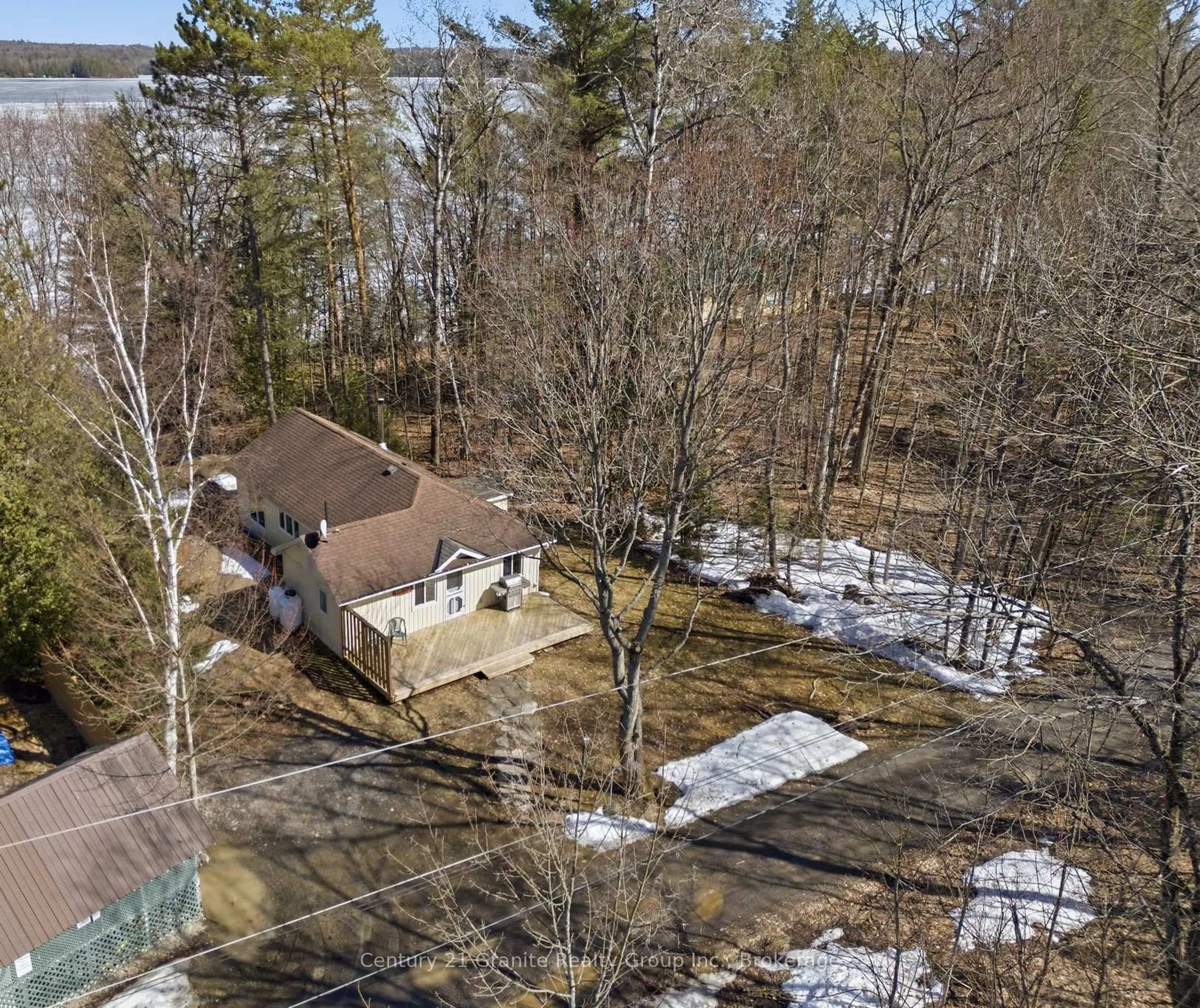 A pic from outside/outdoor area/front of a property/back of a property/a pic from drone, water/lake/river/ocean view for 1035 Harvest Moon Lane, Algonquin Highlands Ontario K0M 1S0