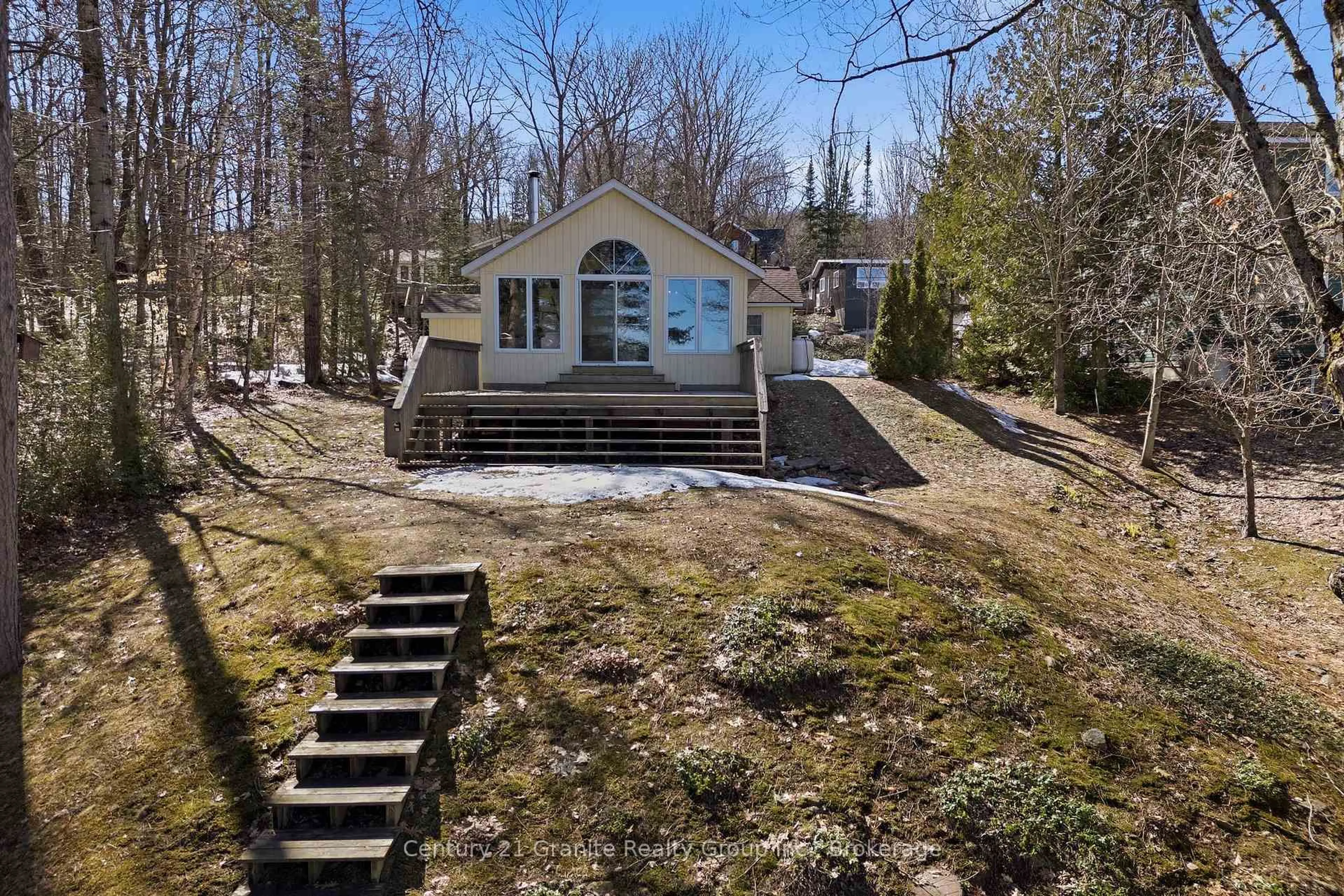 A pic from outside/outdoor area/front of a property/back of a property/a pic from drone, water/lake/river/ocean view for 1035 Harvest Moon Lane, Algonquin Highlands Ontario K0M 1S0