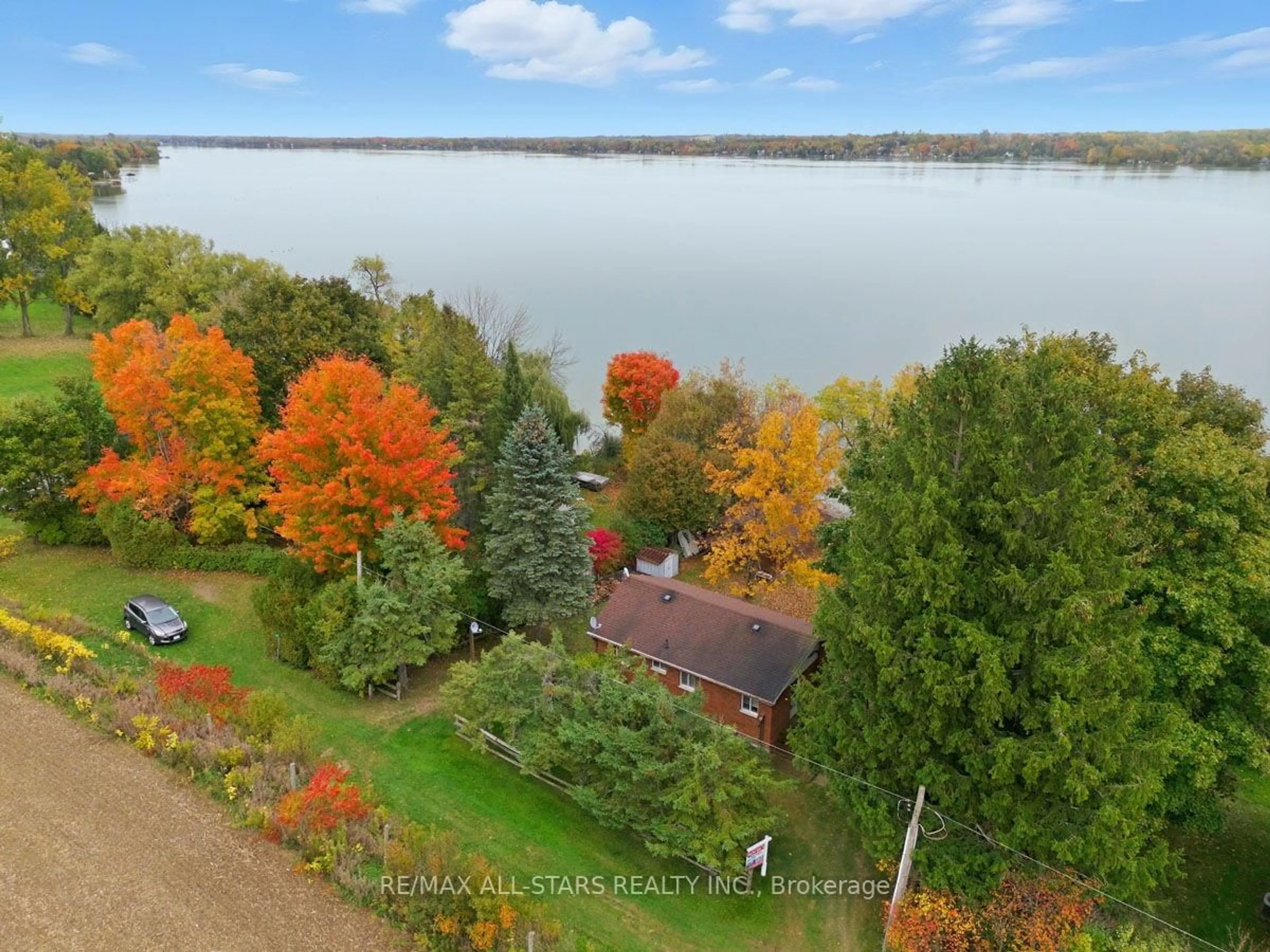 A pic from outside/outdoor area/front of a property/back of a property/a pic from drone, water/lake/river/ocean view for 94 Plum Point Lane, Kawartha Lakes Ontario K0M 2C0