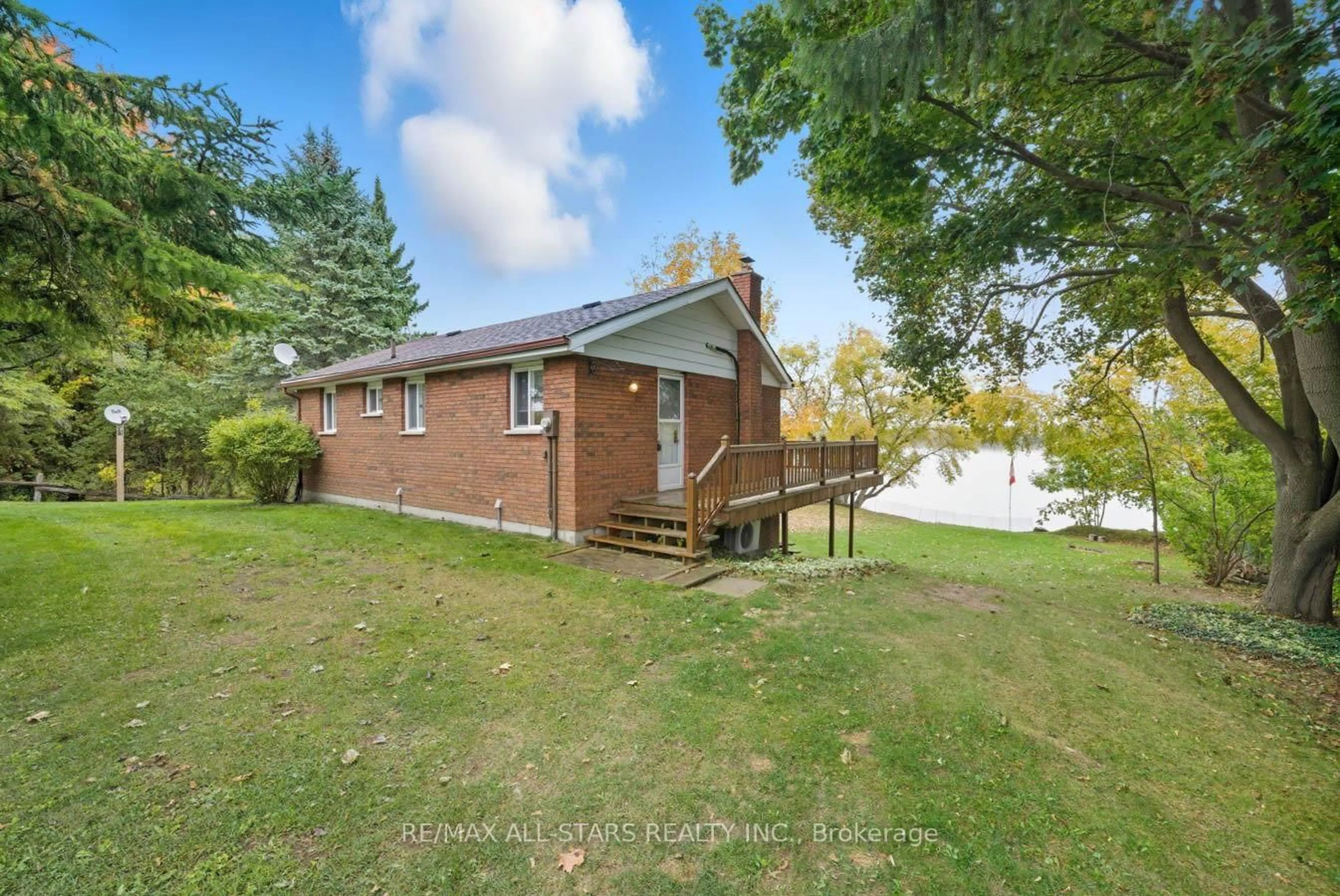 A pic from outside/outdoor area/front of a property/back of a property/a pic from drone, water/lake/river/ocean view for 94 Plum Point Lane, Kawartha Lakes Ontario K0M 2C0
