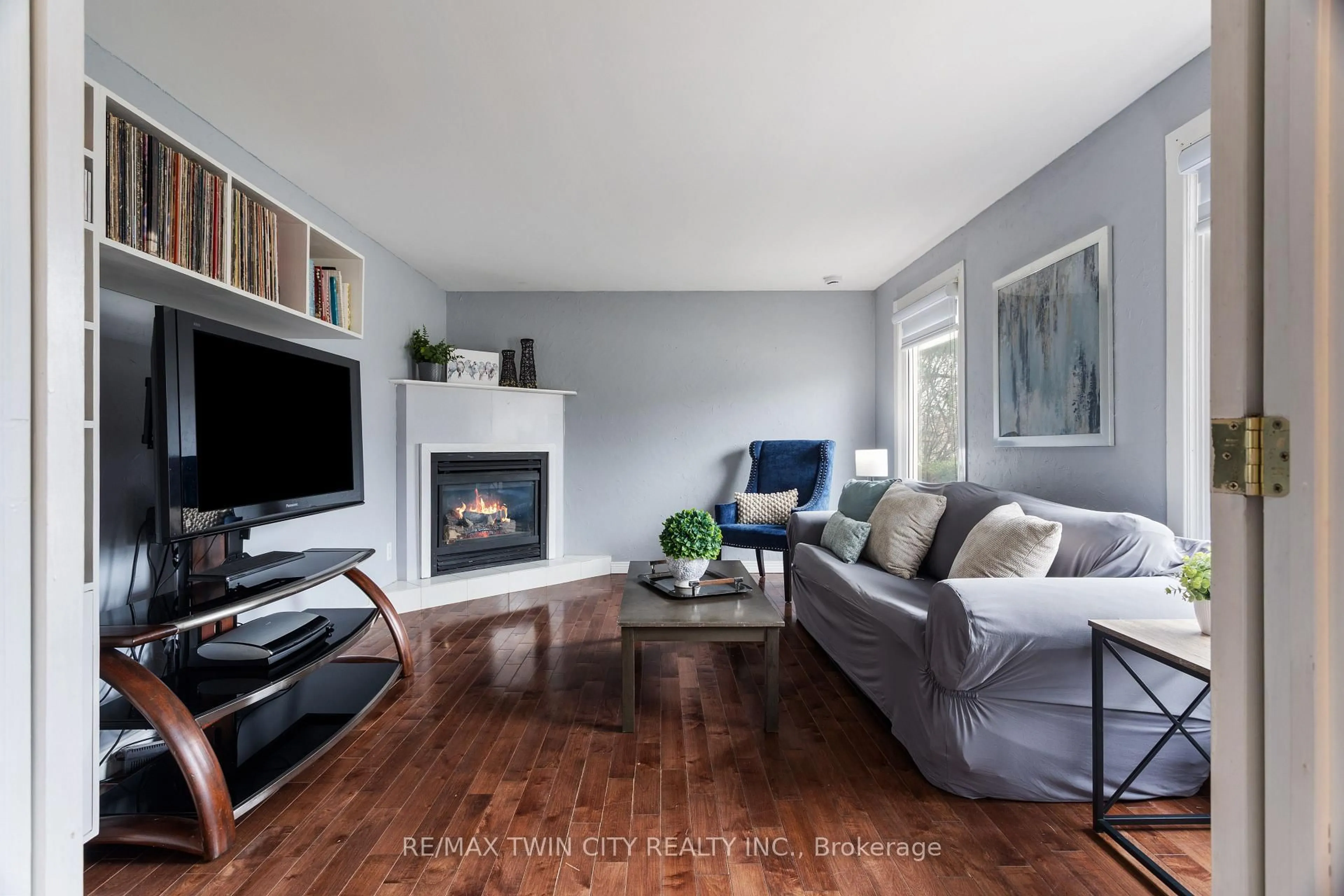 Living room with furniture, wood/laminate floor for 769 Scottsdale Dr, Guelph Ontario N1G 3N7