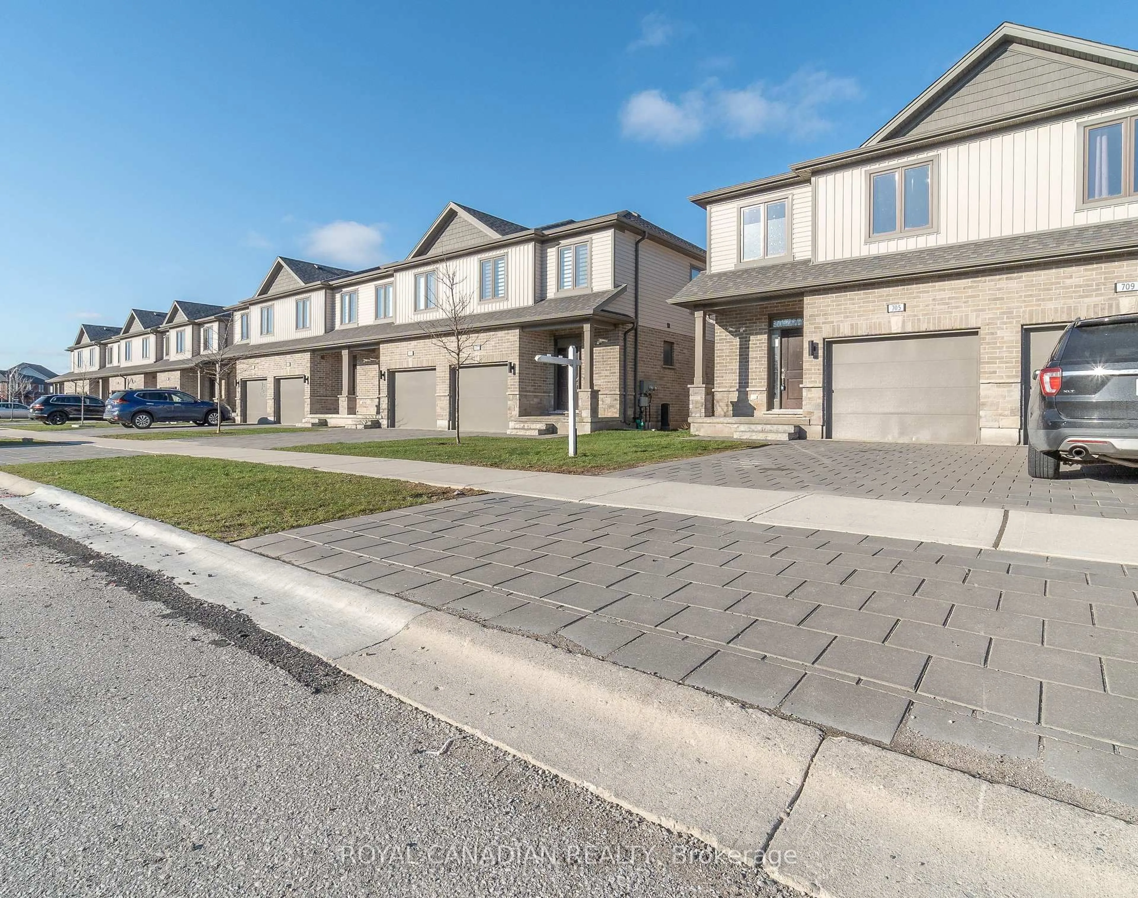 A pic from outside/outdoor area/front of a property/back of a property/a pic from drone, street for 705 Chelton Rd, London South Ontario N6M 0J1