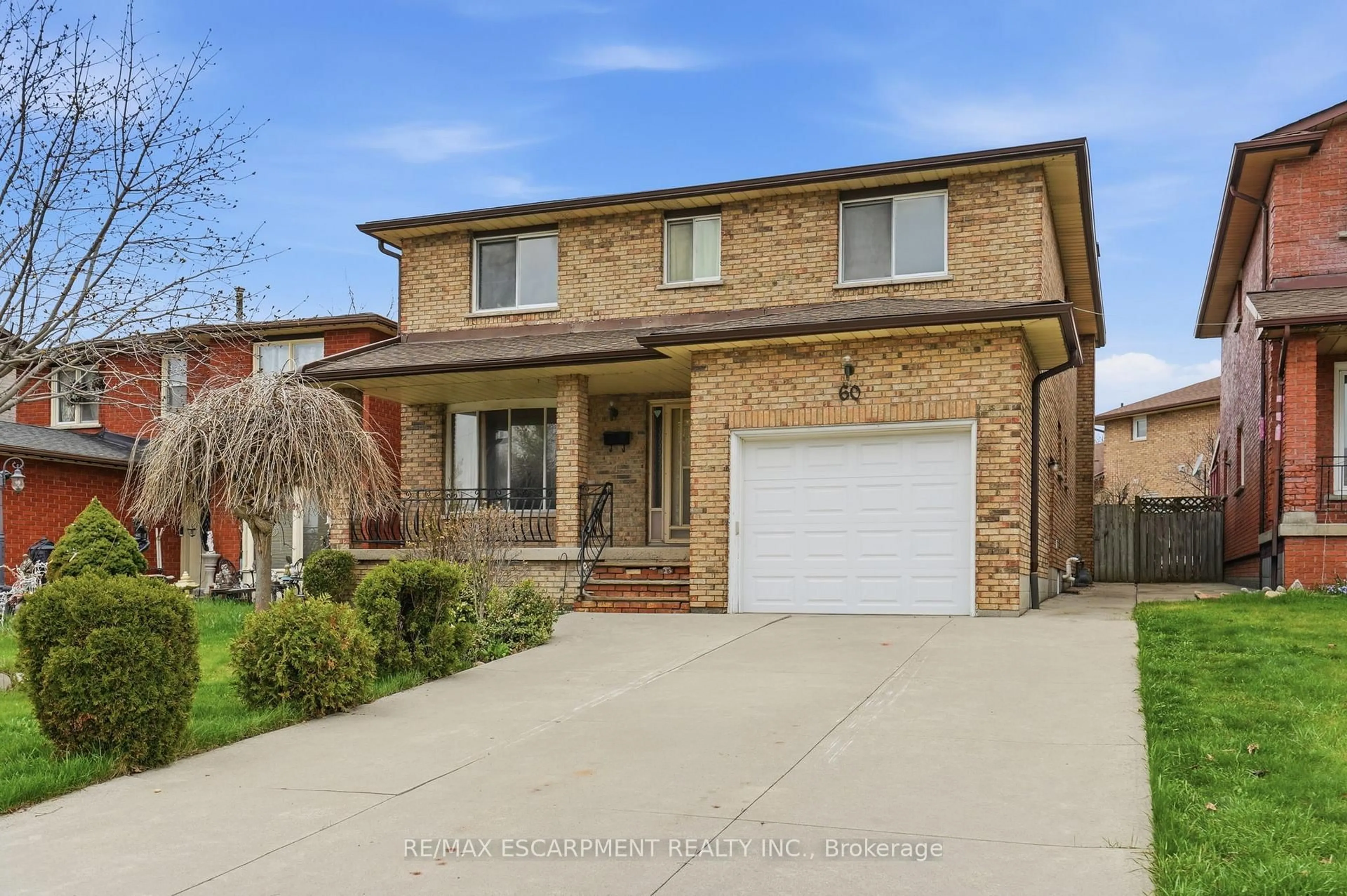 Home with brick exterior material, street for 60 Rexford Dr, Hamilton Ontario L8W 2L9