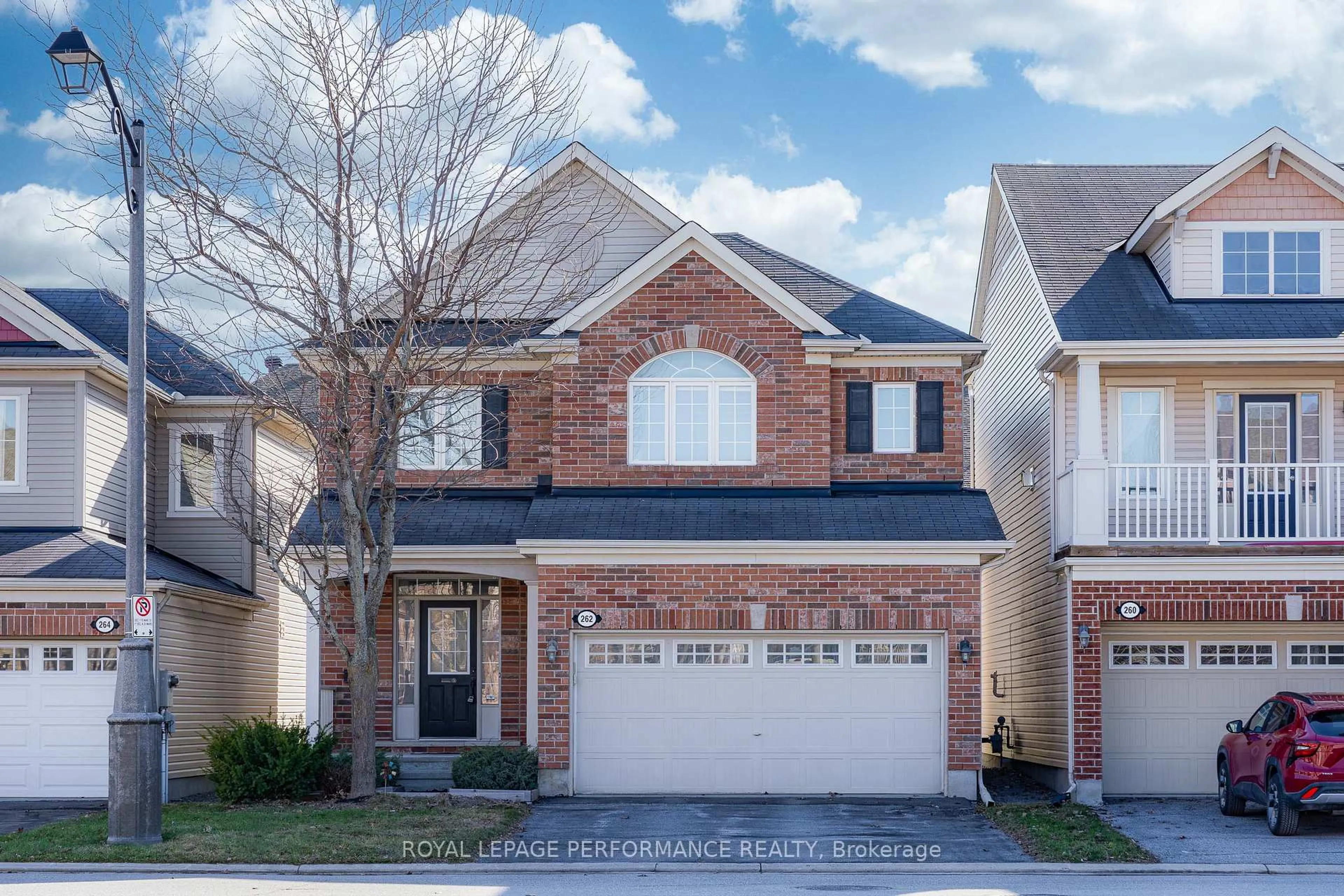 Home with brick exterior material, street for 262 Tempest Dr, Stittsville Ontario K2S 0K6
