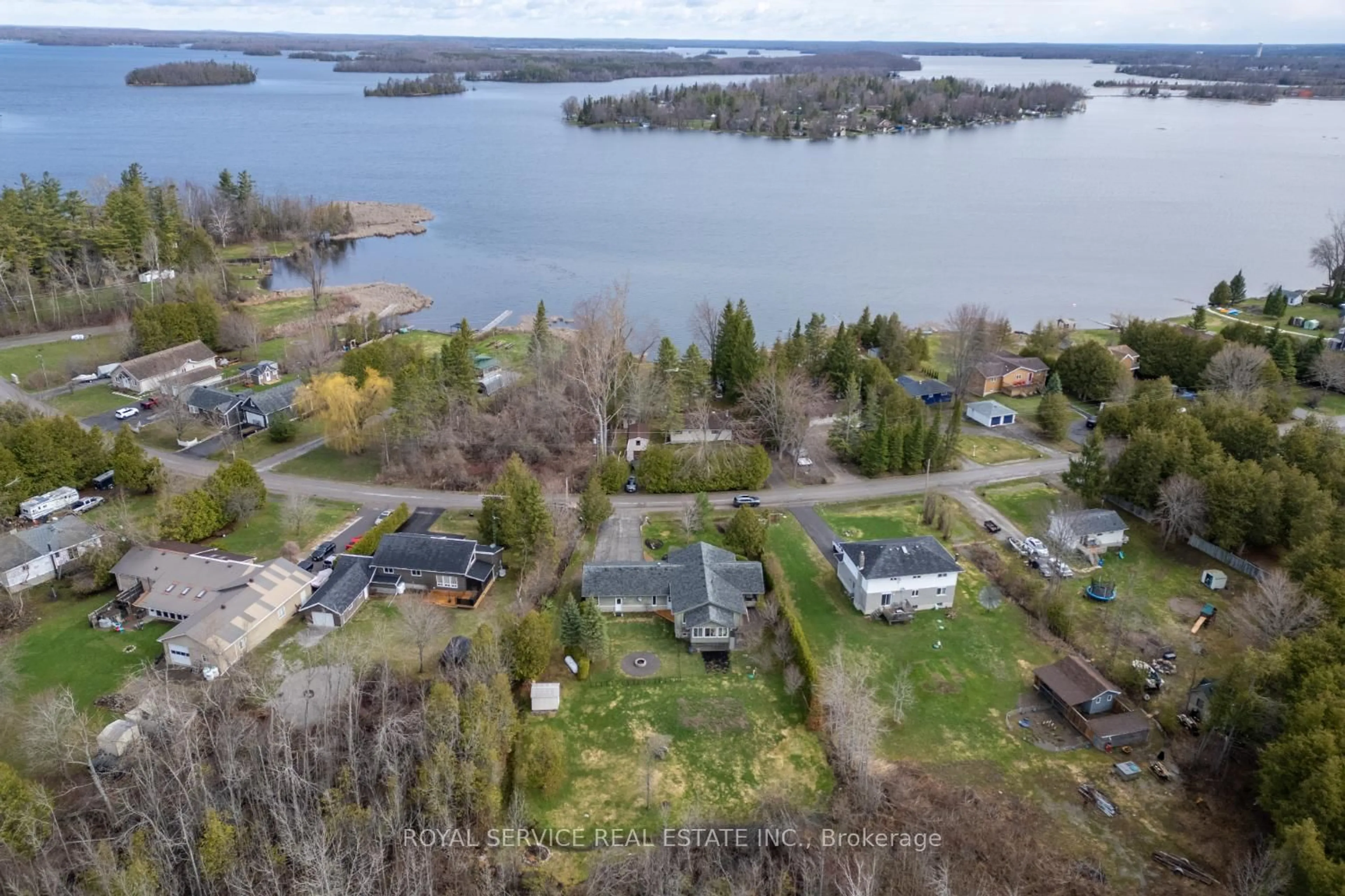 A pic from outside/outdoor area/front of a property/back of a property/a pic from drone, water/lake/river/ocean view for 821 Kimberly Dr, Selwyn Ontario K0L 1T0