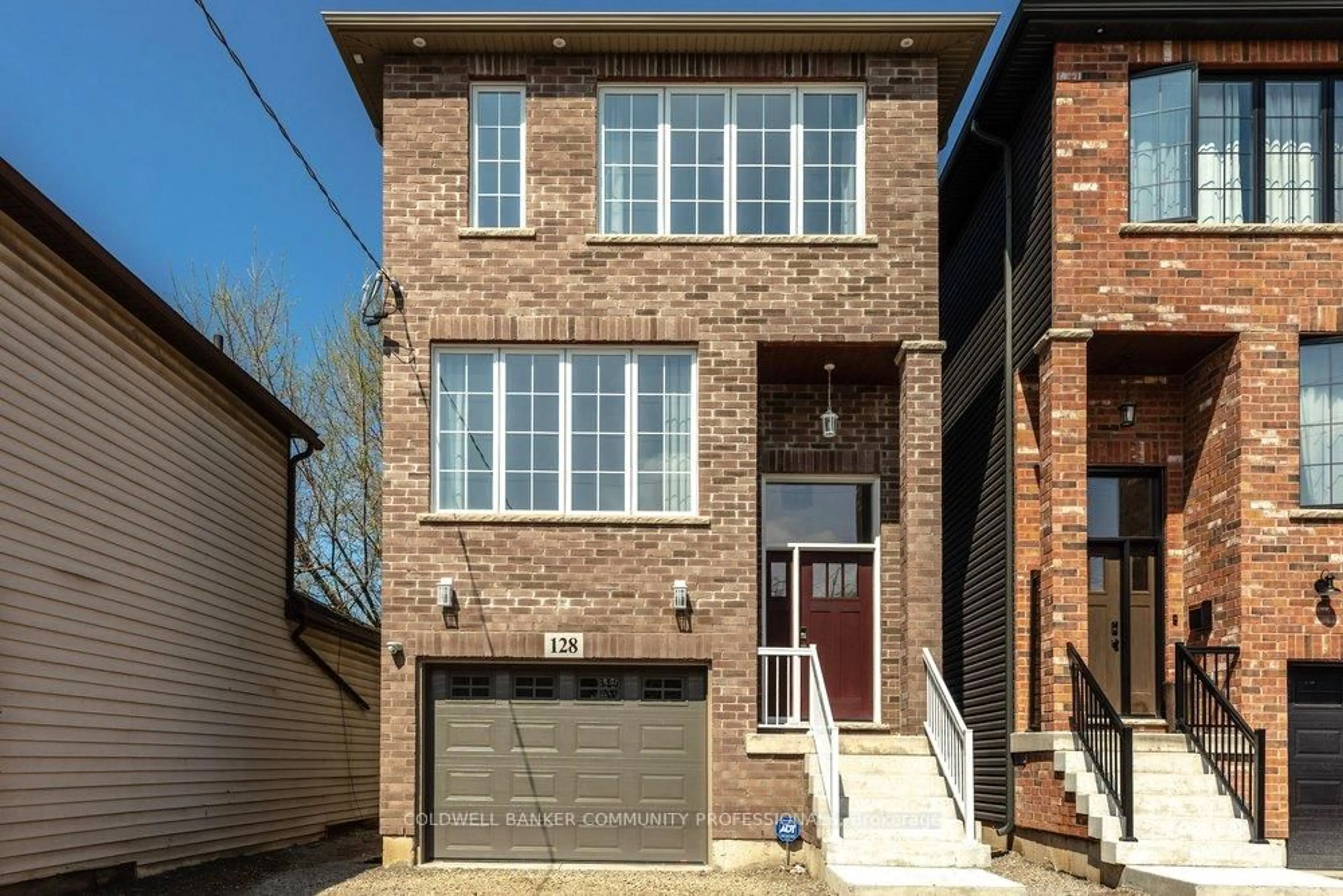Home with brick exterior material, street for 128 Canada St, Hamilton Ontario L8P 1P5