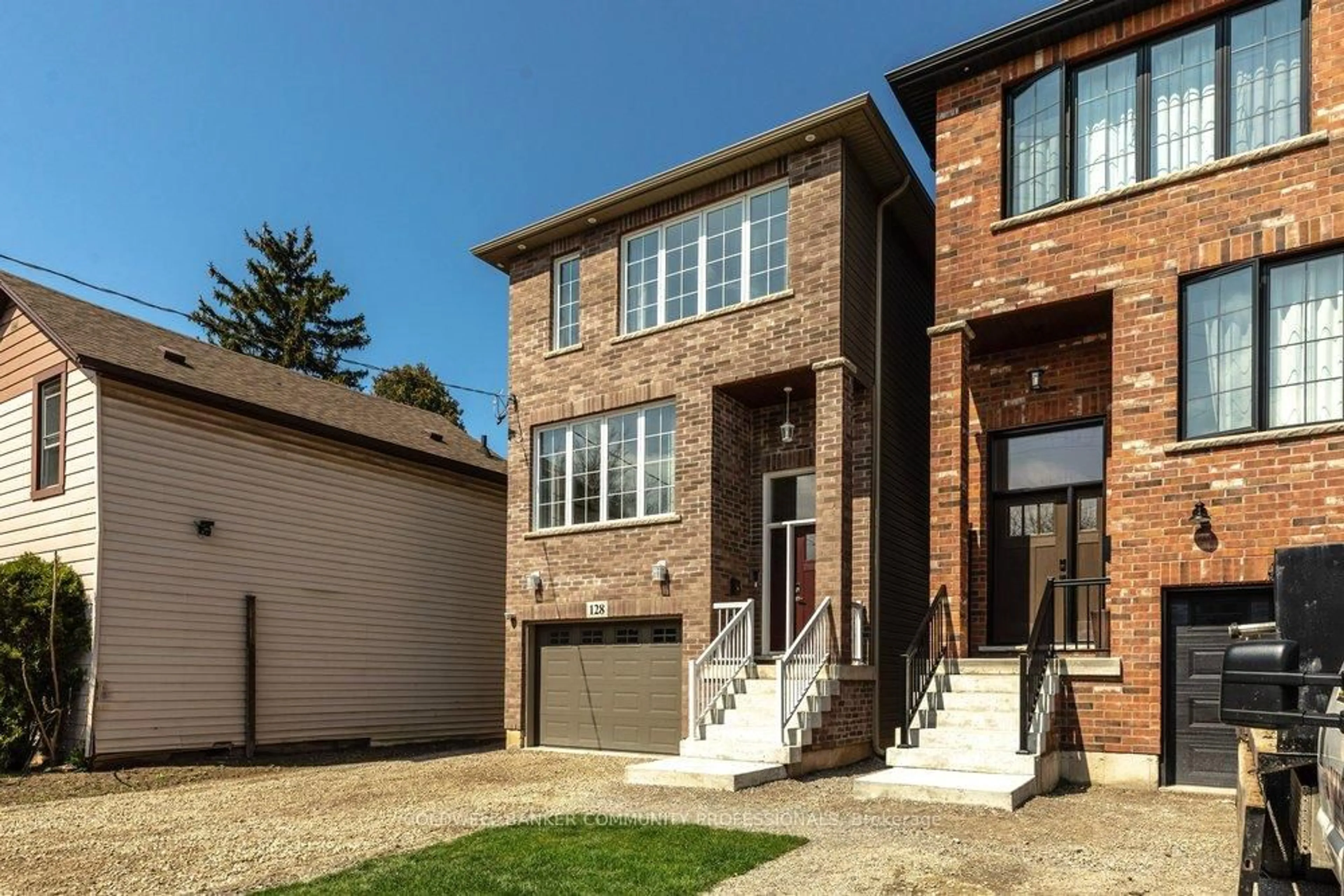 Home with brick exterior material, street for 128 Canada St, Hamilton Ontario L8P 1P5