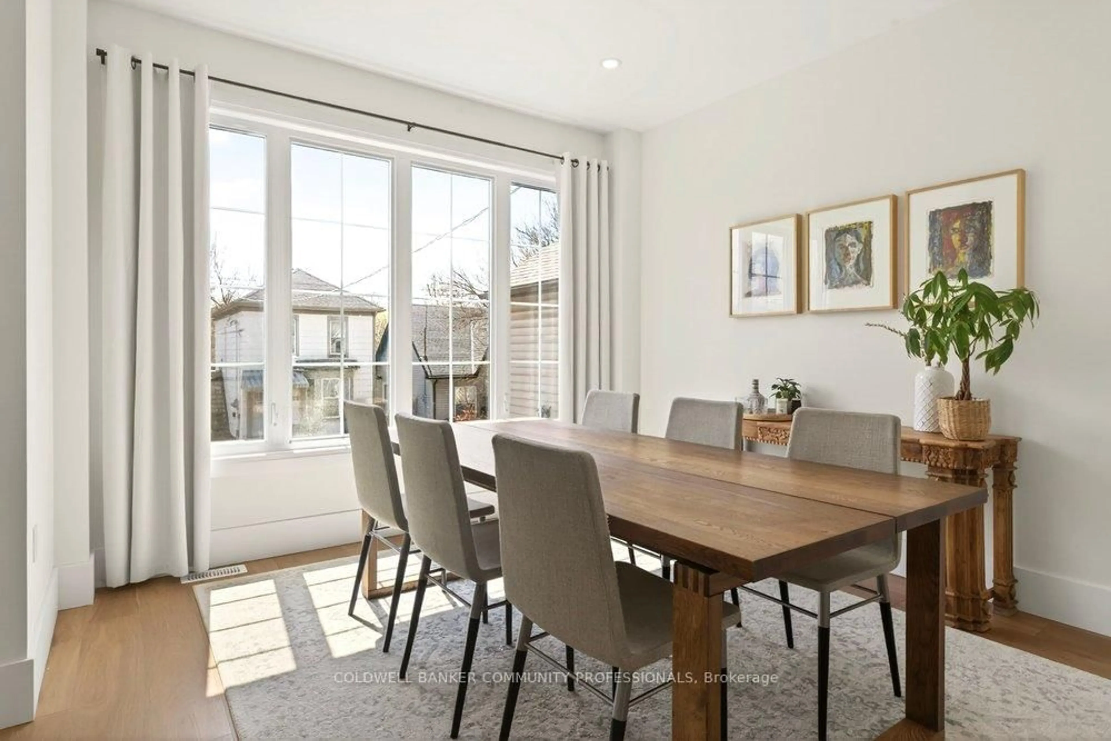 Dining room, wood/laminate floor for 128 Canada St, Hamilton Ontario L8P 1P5