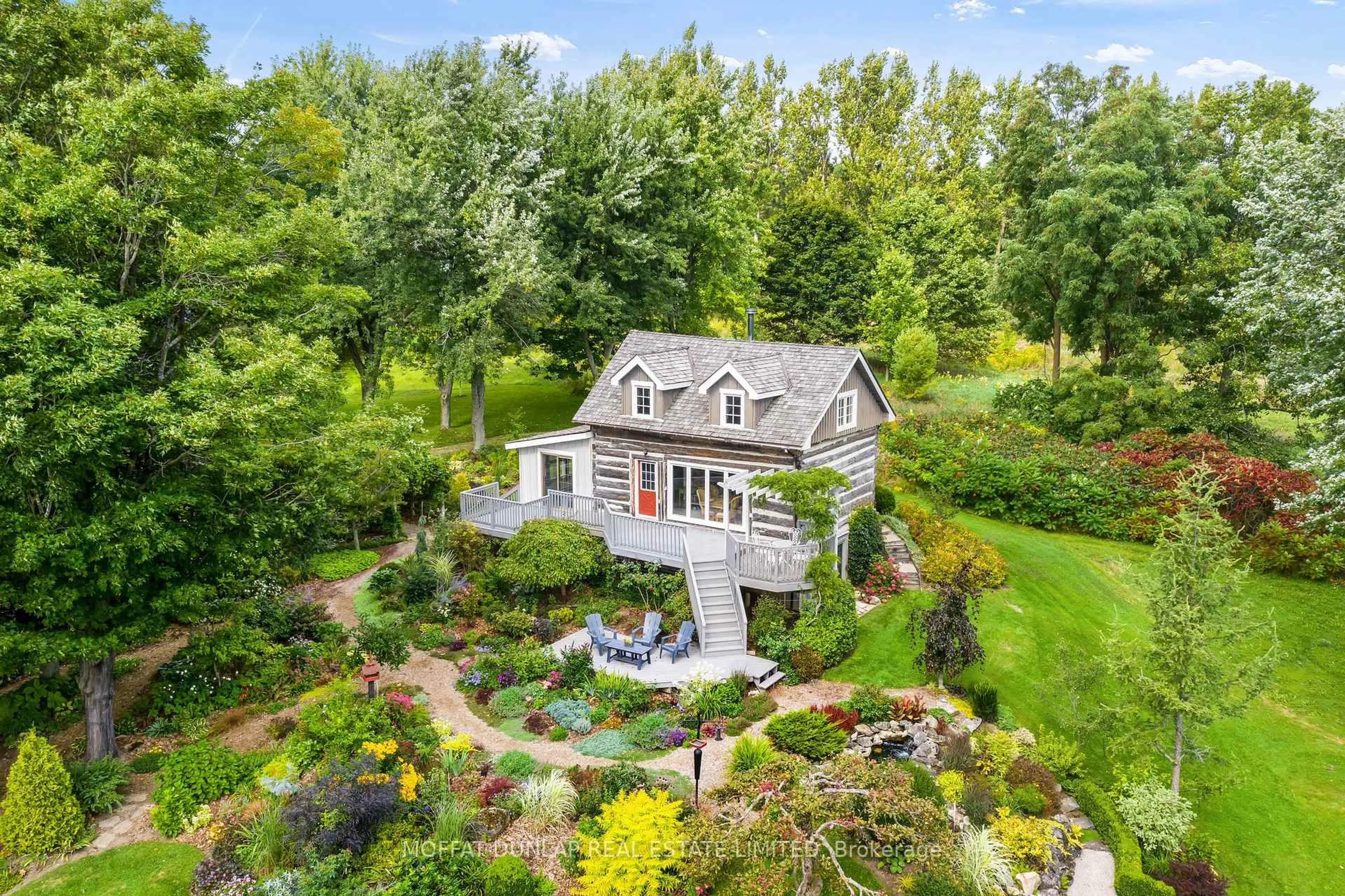 A pic from outside/outdoor area/front of a property/back of a property/a pic from drone, water/lake/river/ocean view for 595327 Blind Line, Mono Ontario L9V 0Z3