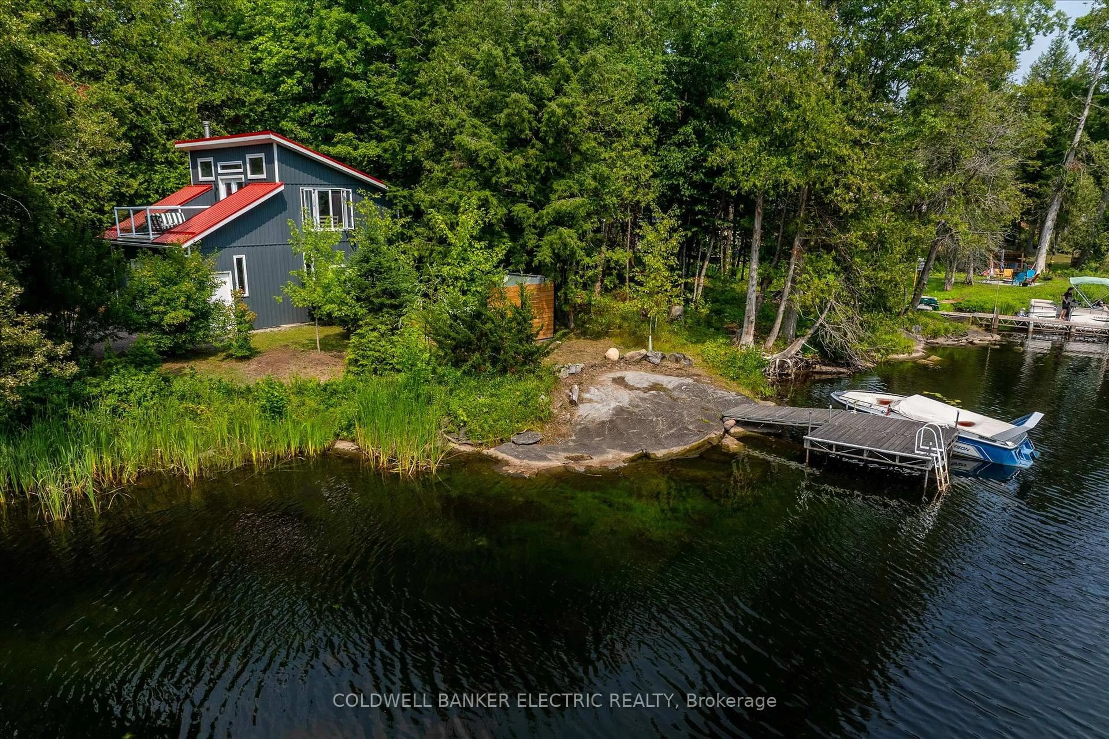 A pic from outside/outdoor area/front of a property/back of a property/a pic from drone, water/lake/river/ocean view for 411 Fidlar Glen Rd, Limoges Ontario K0K 2M0