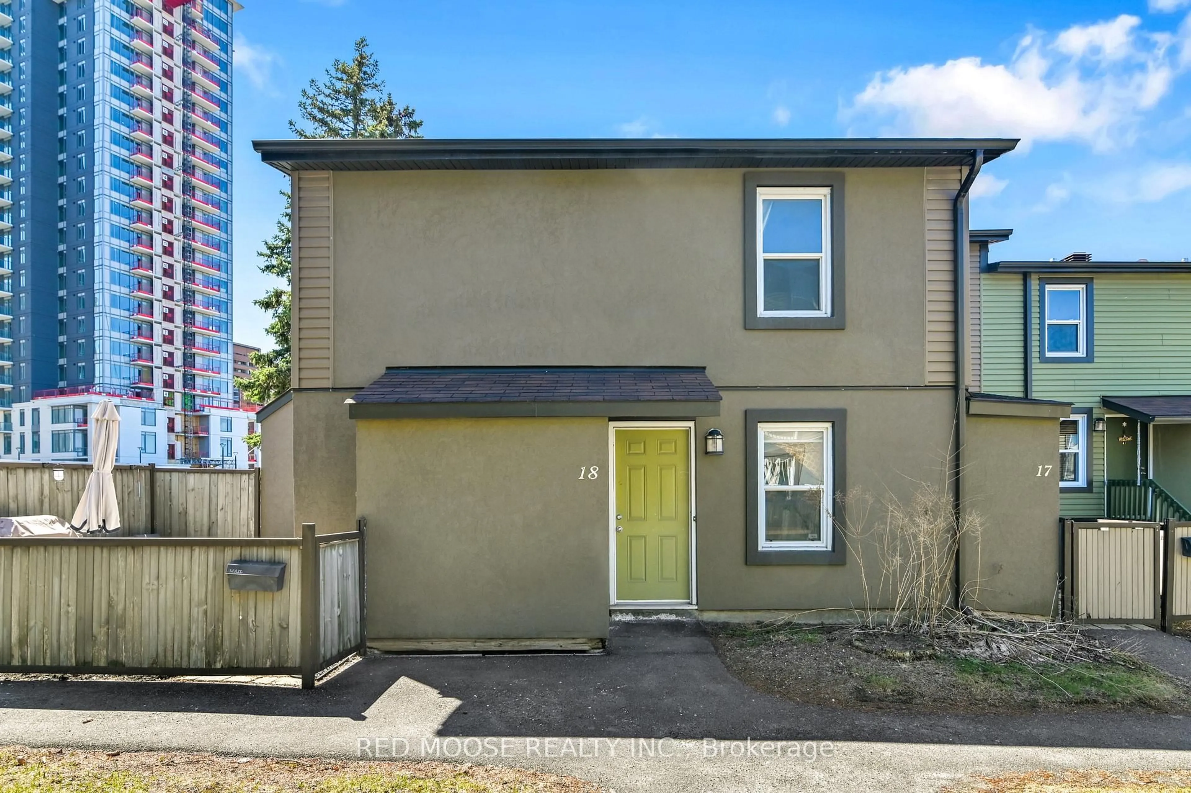 A pic from outside/outdoor area/front of a property/back of a property/a pic from drone, street for 1250 Mcwatters Rd #18, Ottawa Ontario K2C 3P5