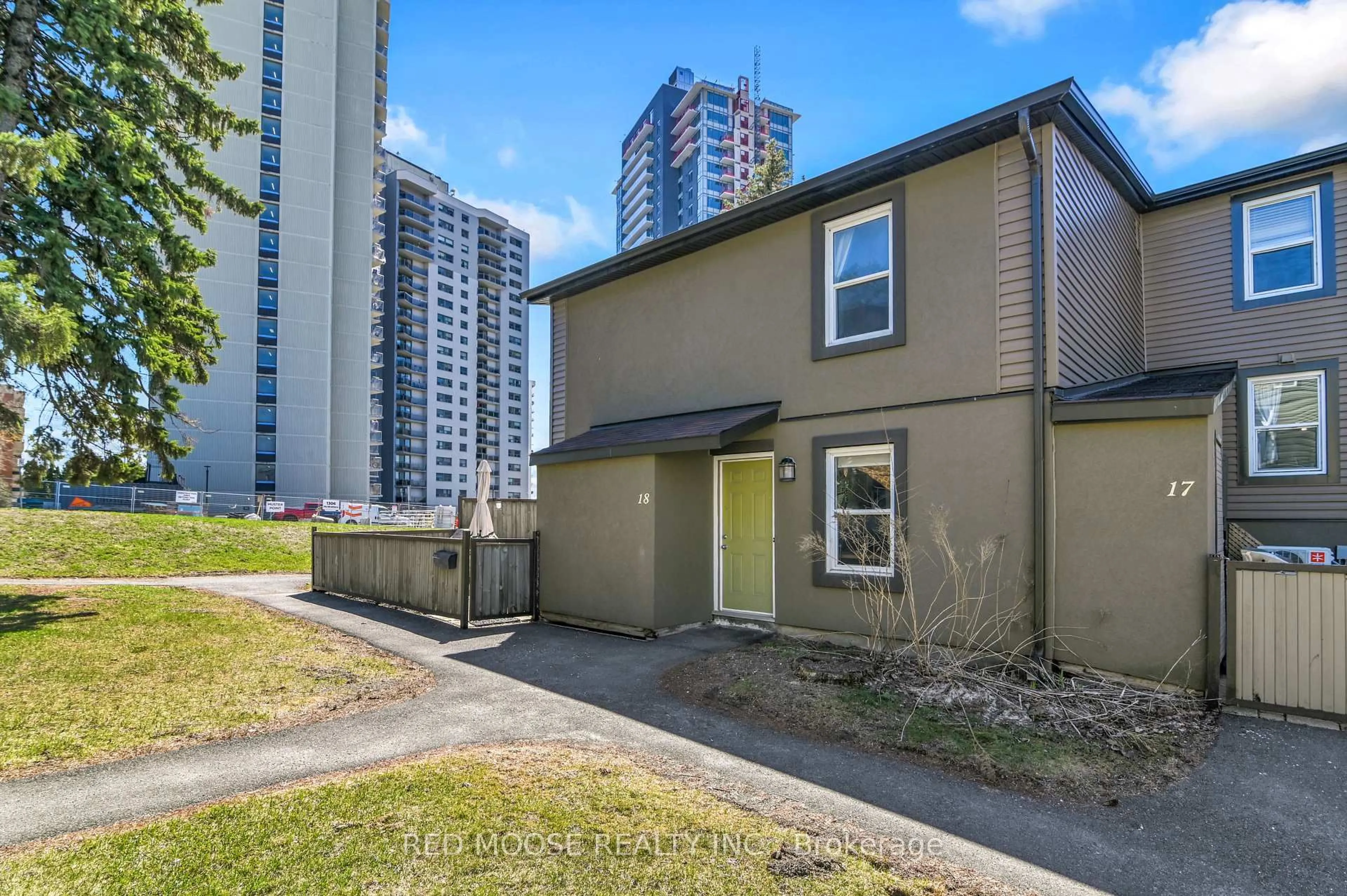 A pic from outside/outdoor area/front of a property/back of a property/a pic from drone, street for 1250 Mcwatters Rd #18, Ottawa Ontario K2C 3P5