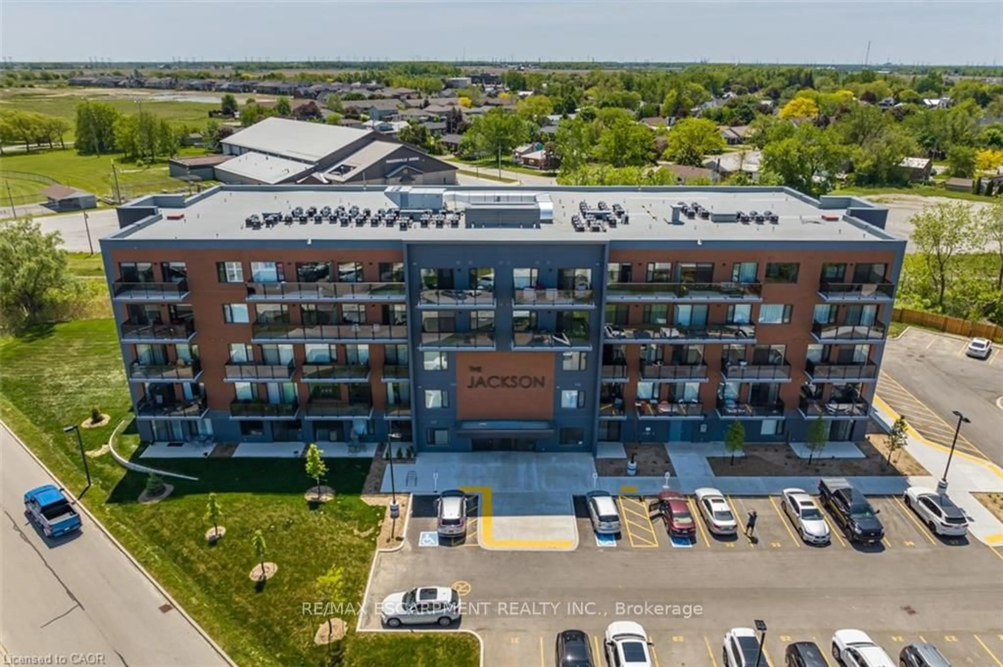 A pic from outside/outdoor area/front of a property/back of a property/a pic from drone, building for 64 Main St #303, Haldimand Ontario N0A 1H0