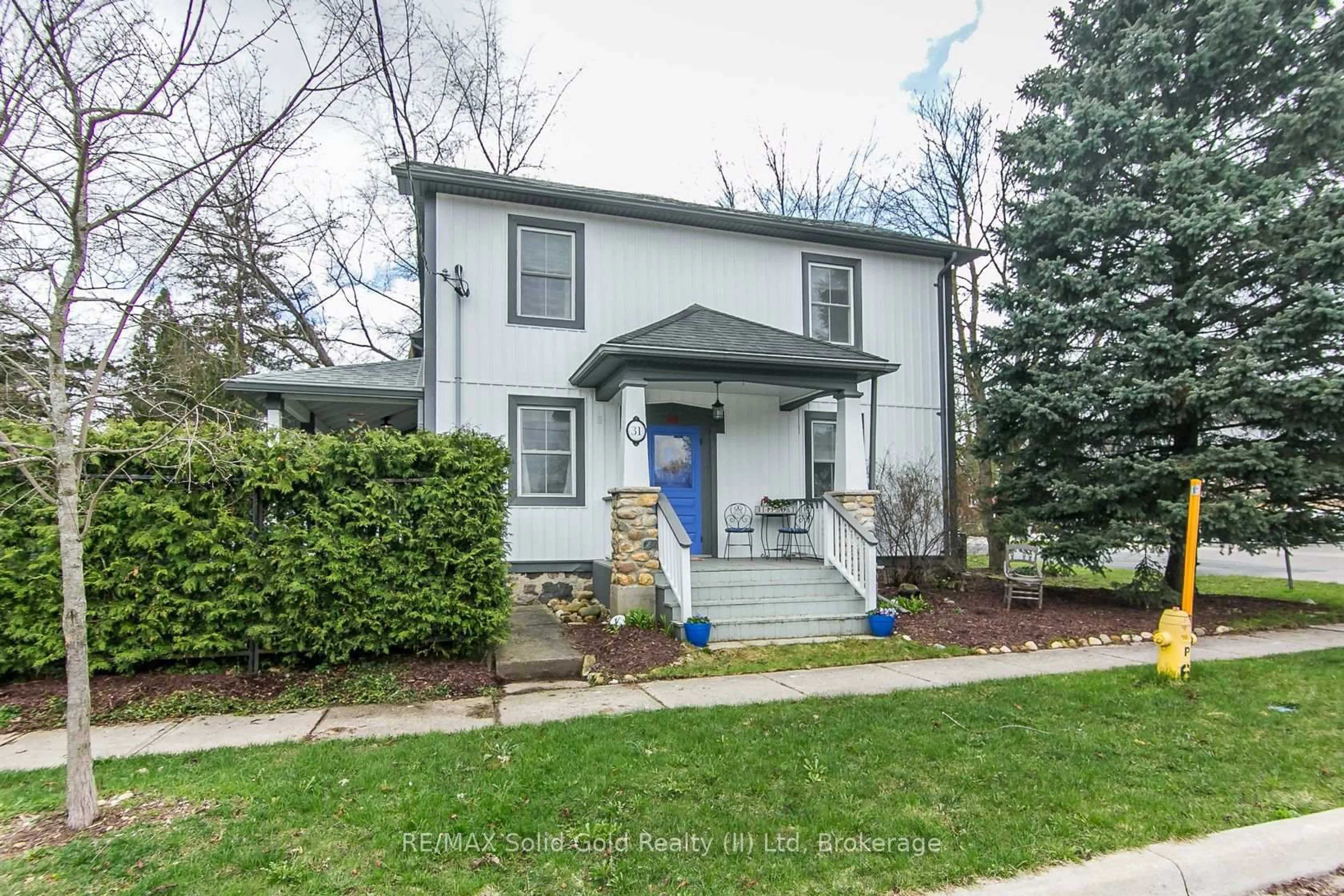 Home with vinyl exterior material, street for 31 Front St, Woolwich Ontario N0B 2N0