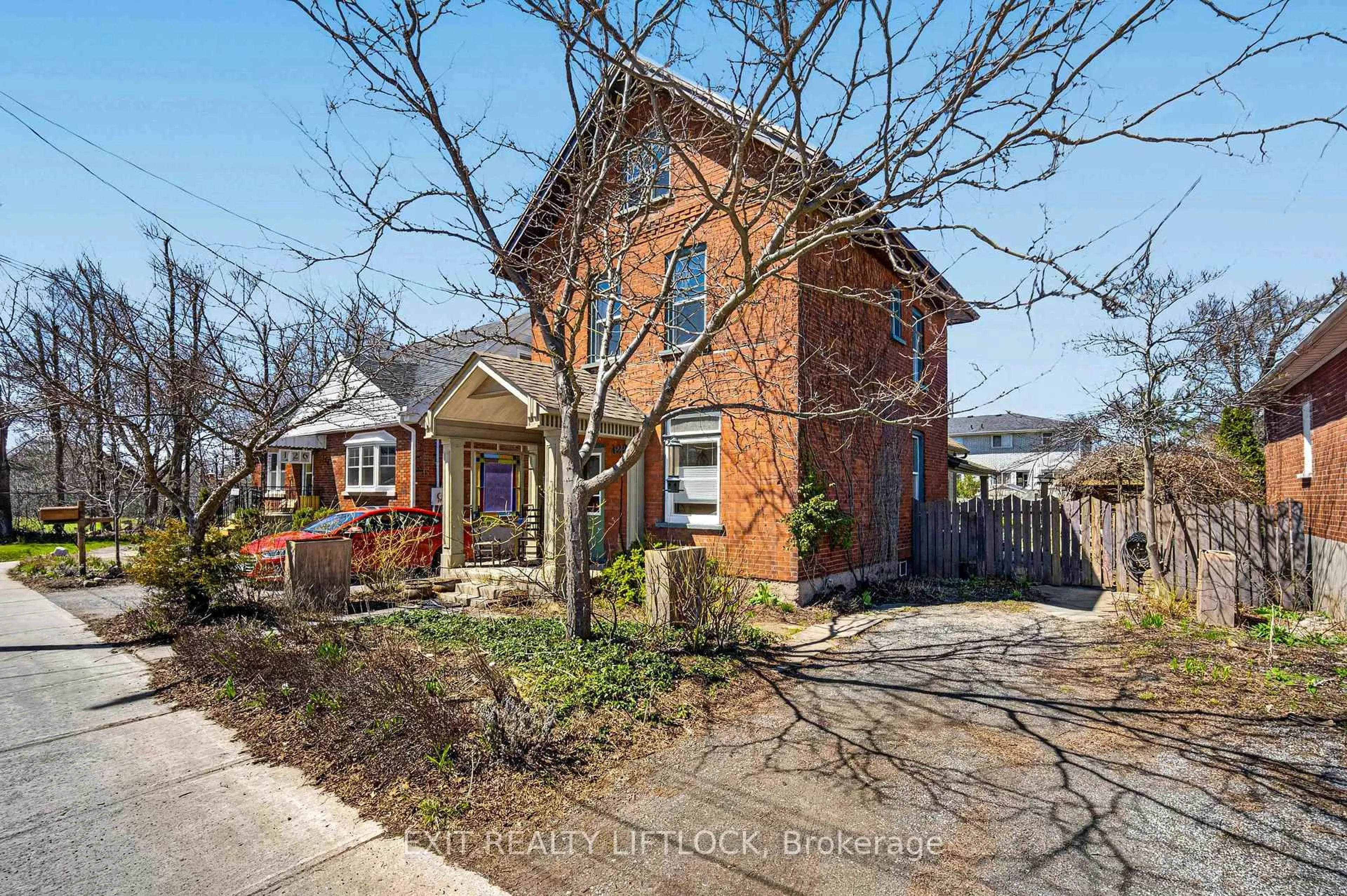 Home with brick exterior material, street for 128 Sutherland Pl, Peterborough Ontario K9H 1J1