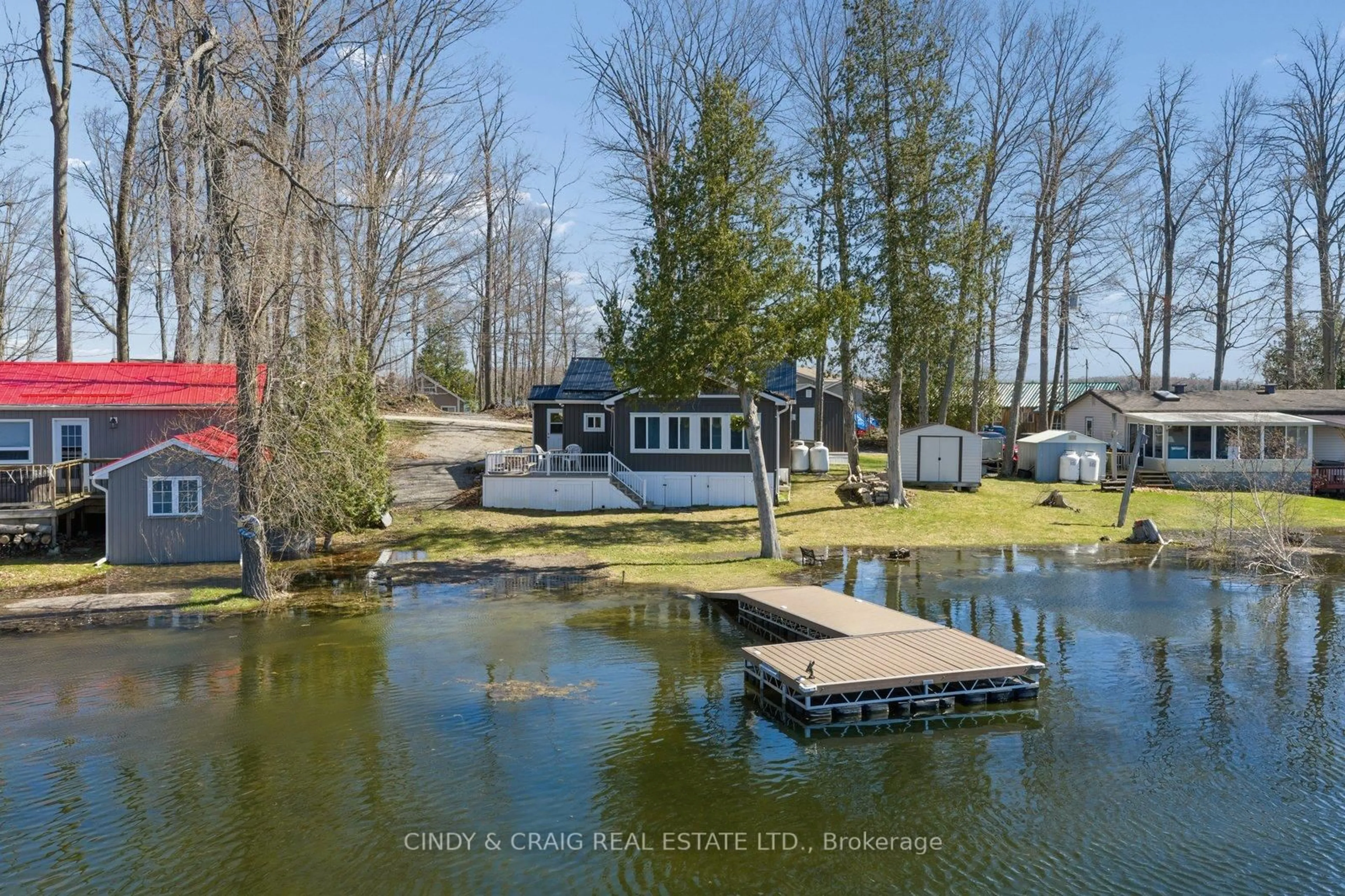 A pic from outside/outdoor area/front of a property/back of a property/a pic from drone, water/lake/river/ocean view for 213 Rollies Point Rd, Selwyn Ontario K0L 1R0