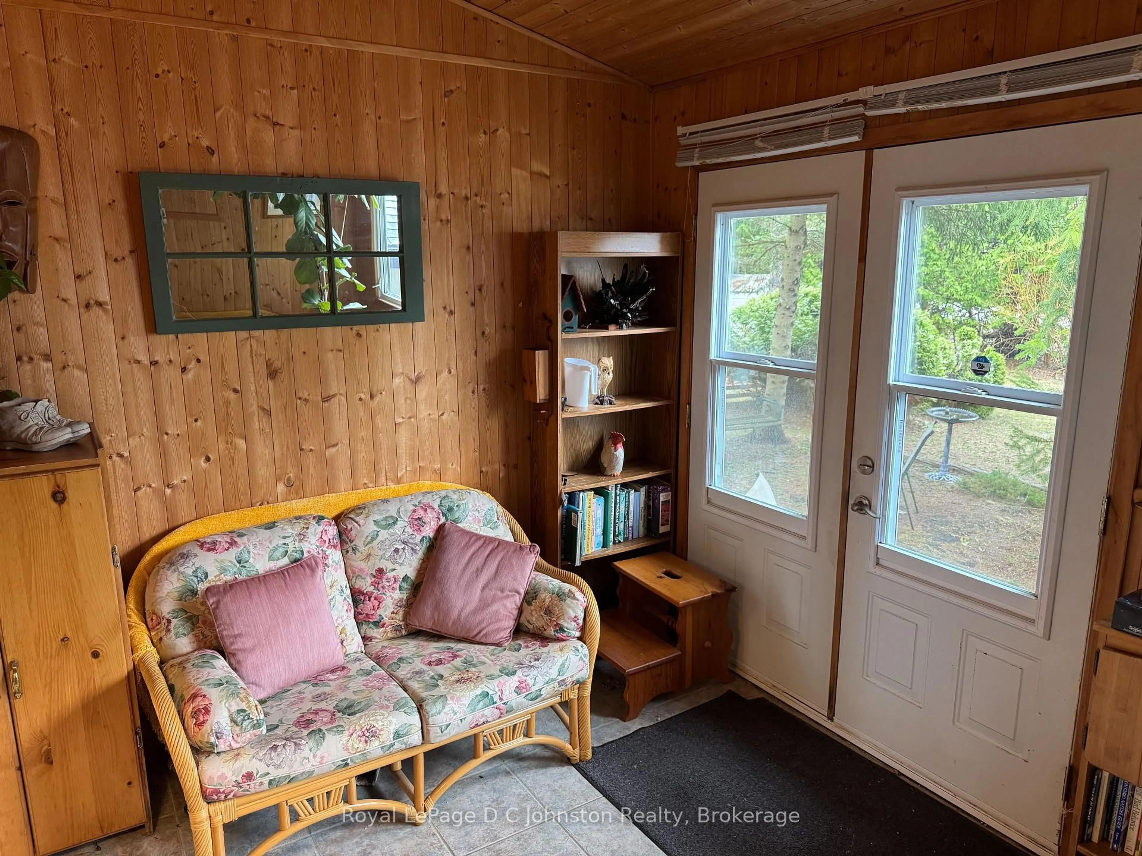 Living room with furniture, wood/laminate floor for 373 Carlisle St, Saugeen Shores Ontario N0H 2L0