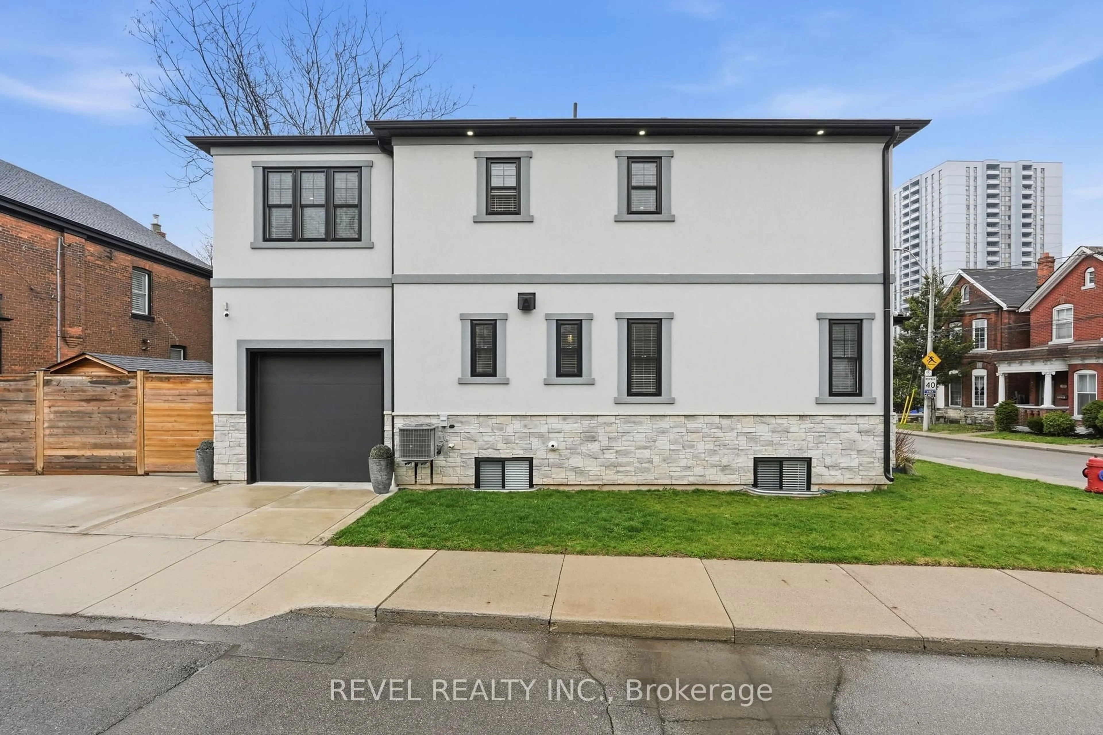 Home with brick exterior material, street for 109 Ray St, Hamilton Ontario L8R 2Y1