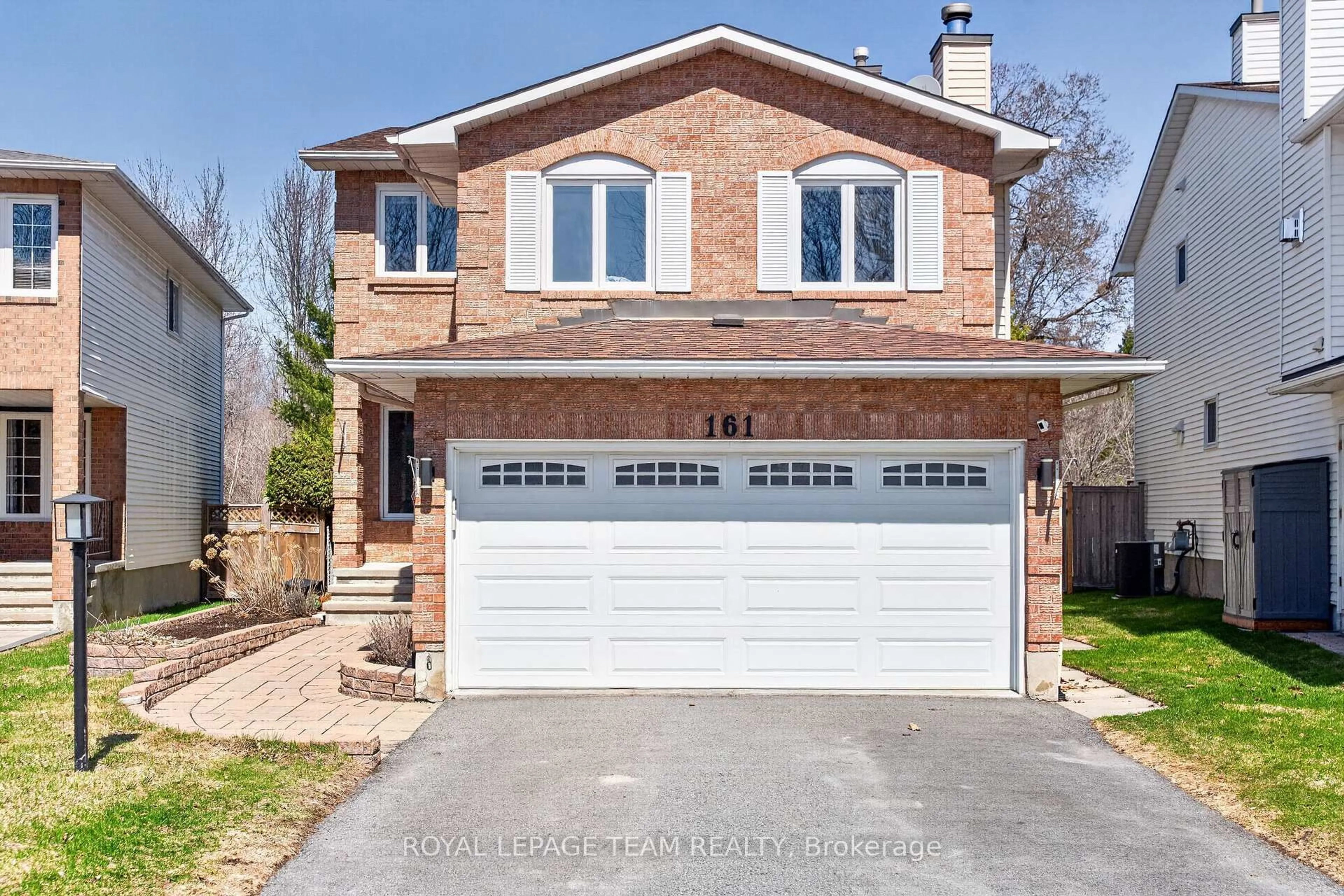 Home with brick exterior material, street for 161 Springwater Dr, Ottawa Ontario K2M 1Z9