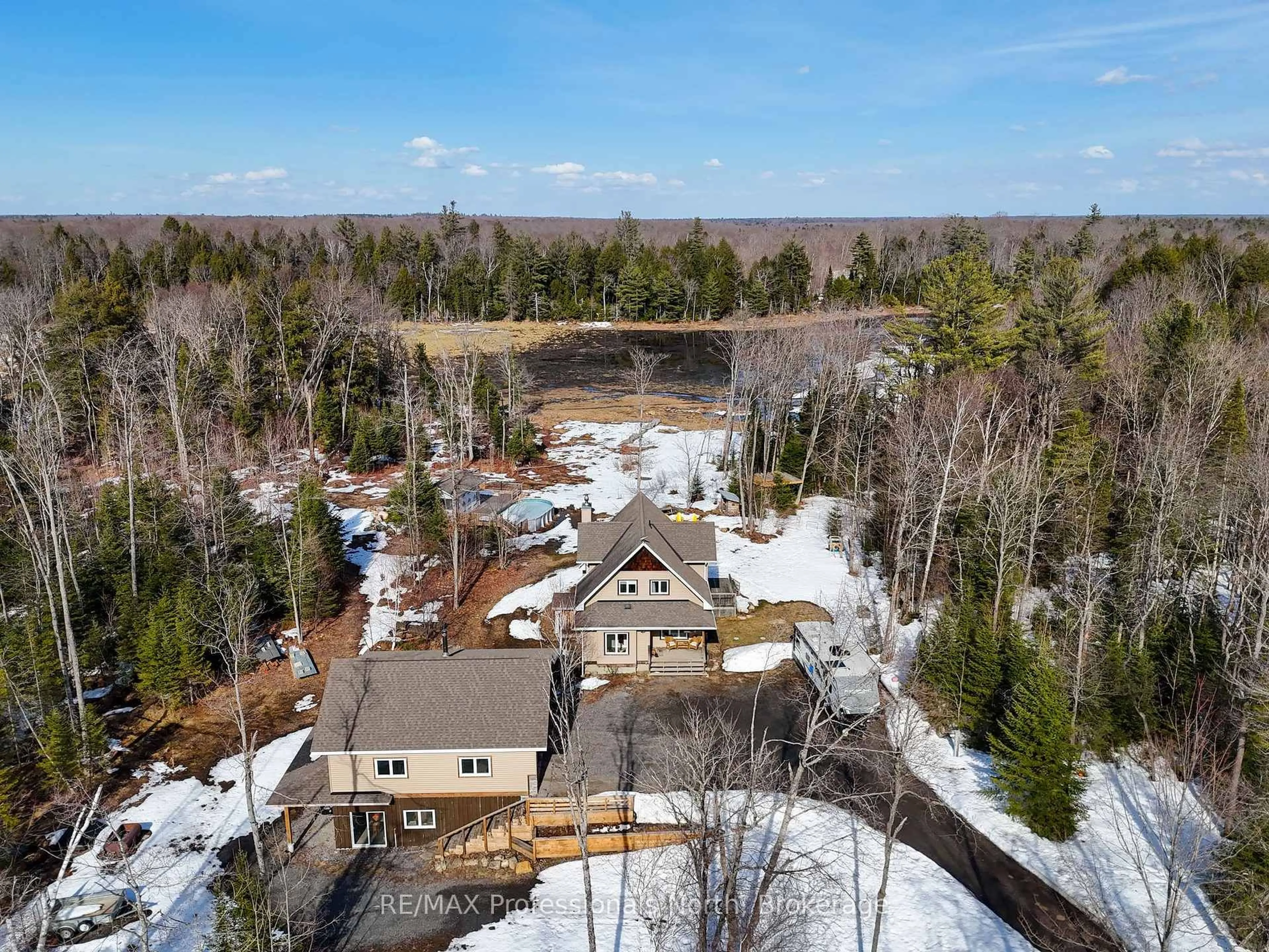 A pic from outside/outdoor area/front of a property/back of a property/a pic from drone, water/lake/river/ocean view for 1289 Purbrook Rd, Bracebridge Ontario P1L 1X3