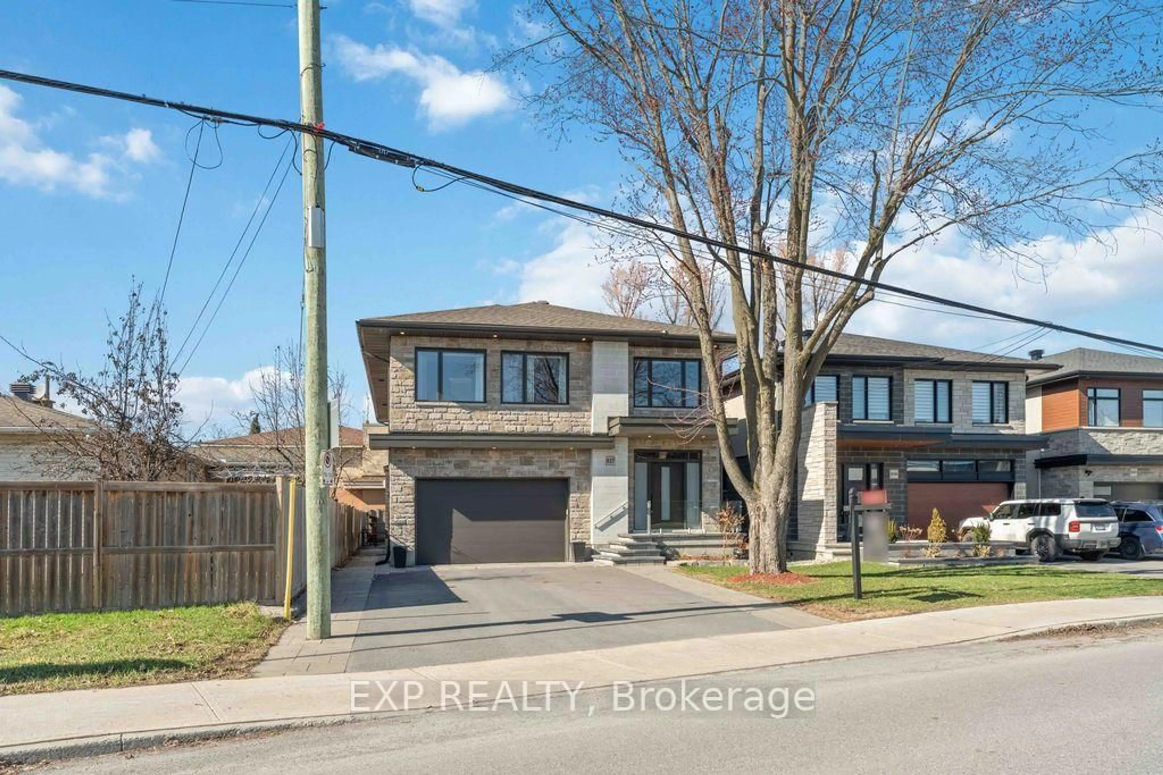 Home with brick exterior material, street for 937 Falaise Rd, Ottawa Ontario K2C 0M1