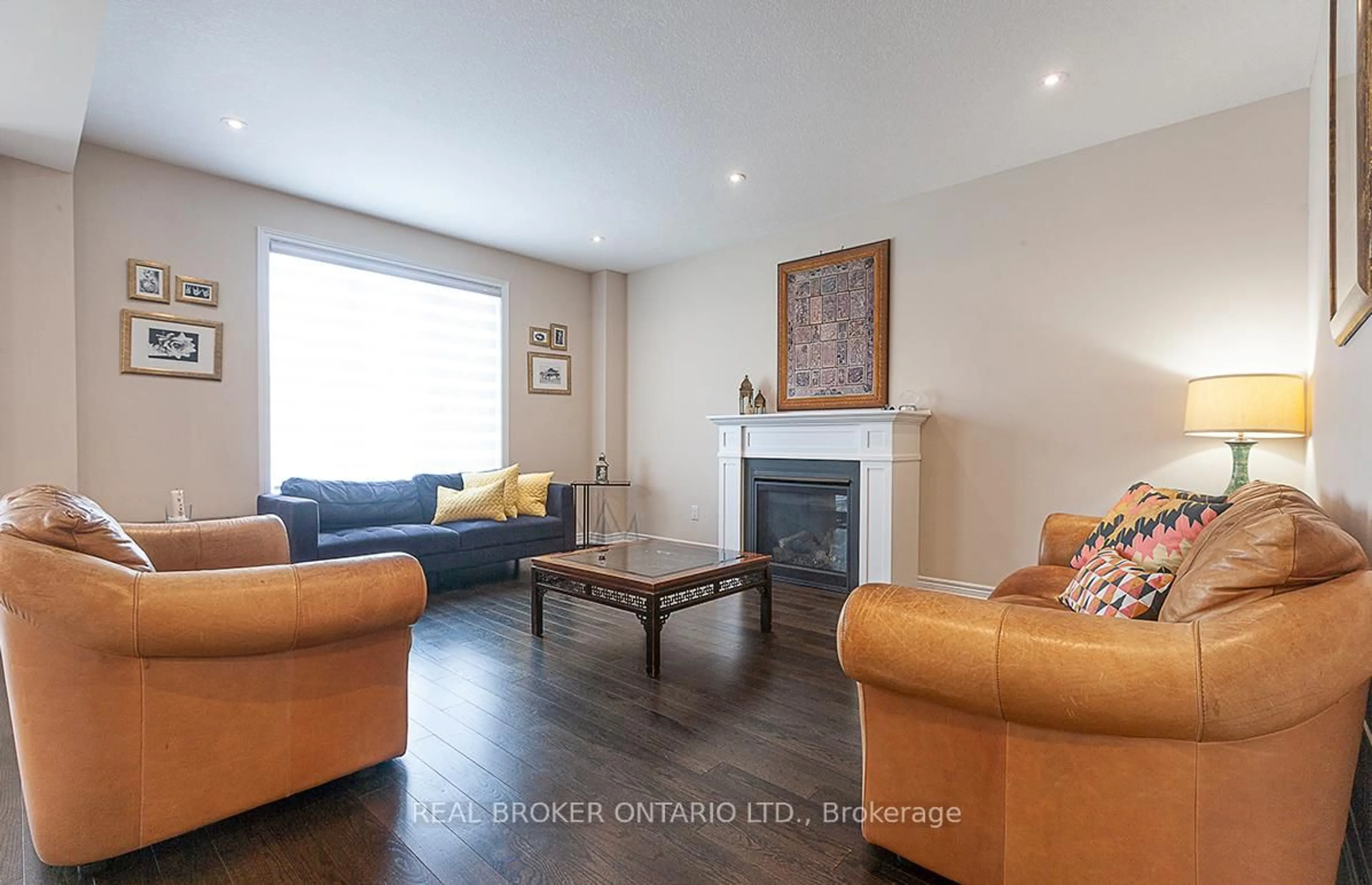 Living room with furniture, wood/laminate floor for 60 Morrison Dr, Hamilton Ontario L9G 3K9