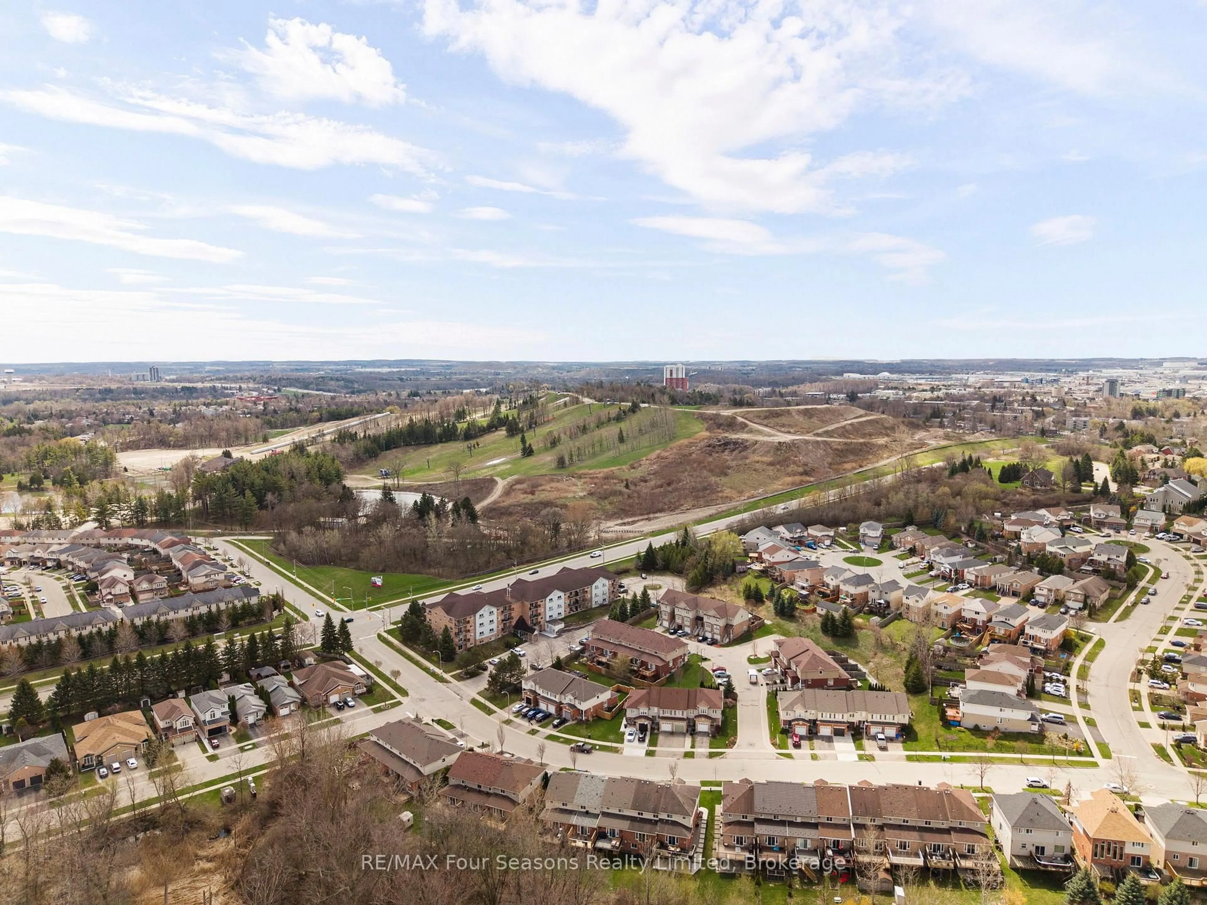 A pic from outside/outdoor area/front of a property/back of a property/a pic from drone, mountain view for 305 Briarmeadow Dr #13, Kitchener Ontario N2A 4K9