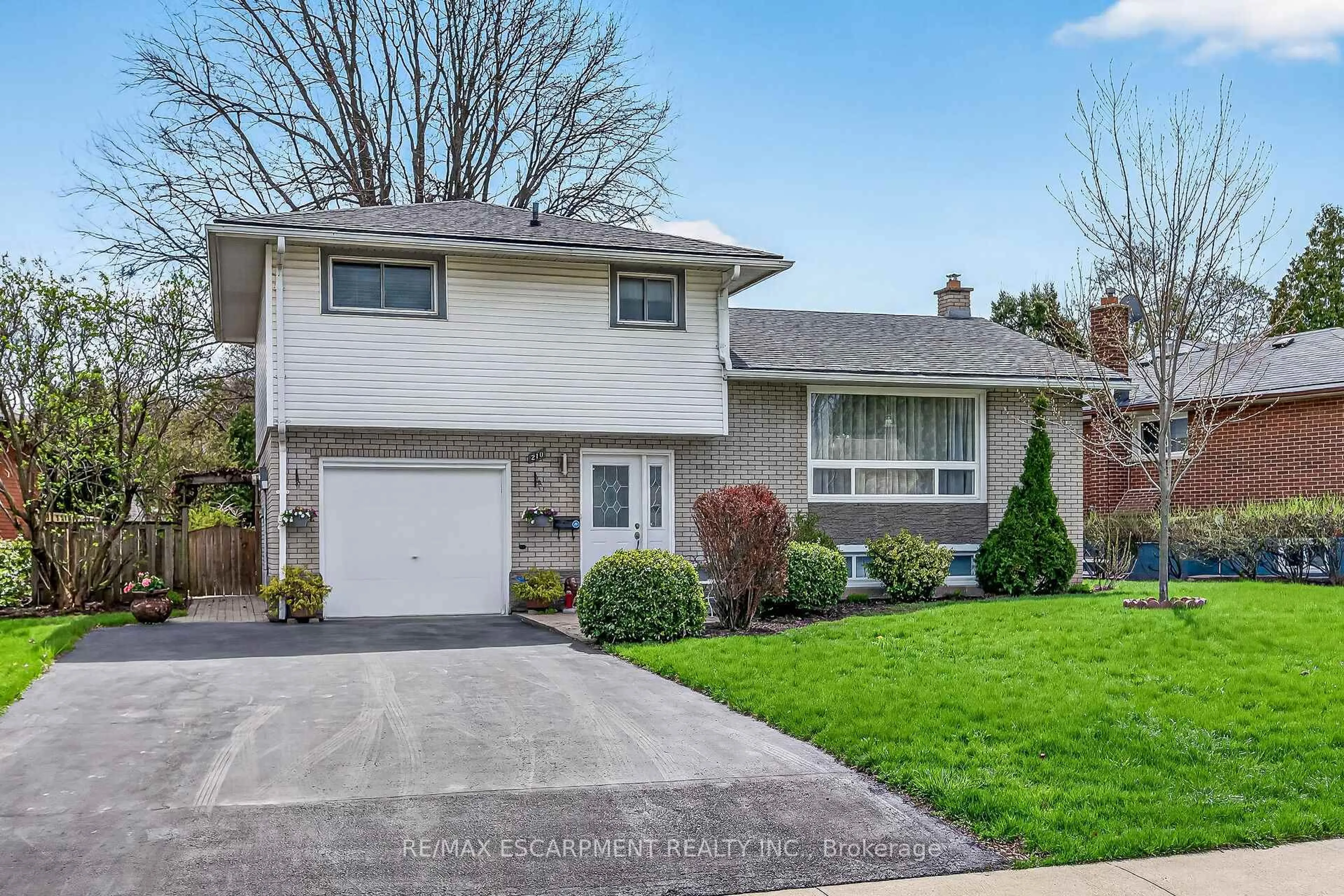 Home with brick exterior material, street for 210 Columbia Dr, Hamilton Ontario L9C 3Y6