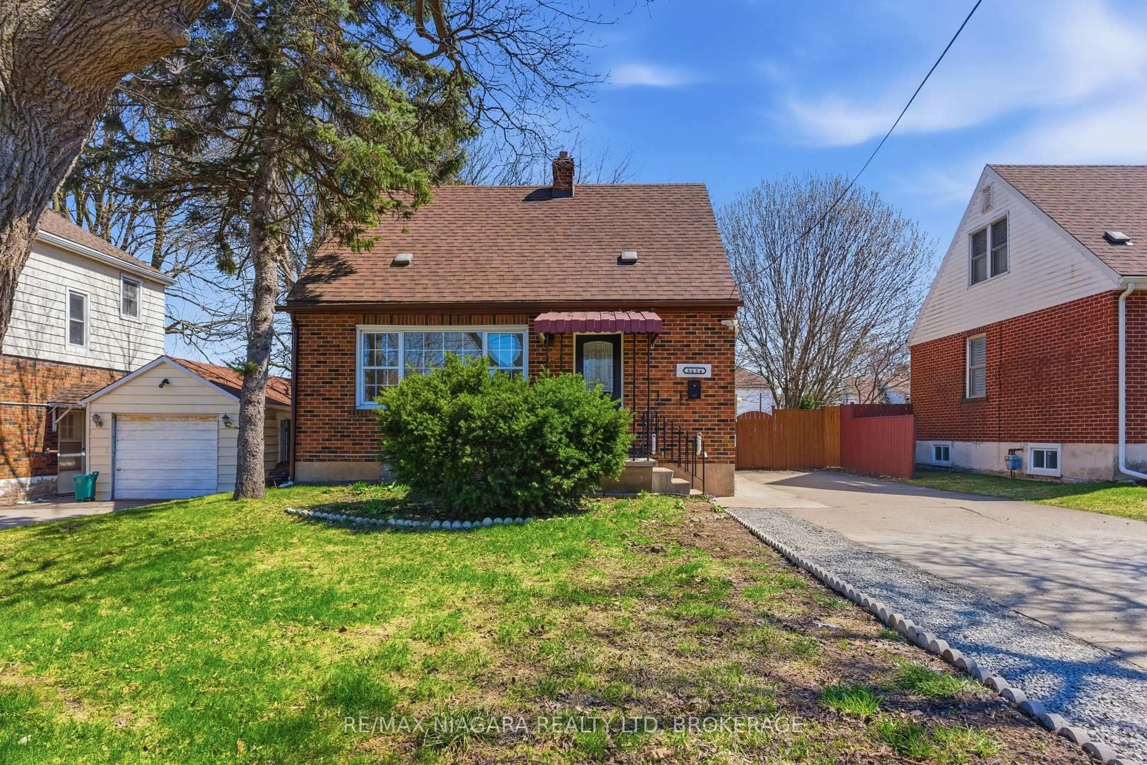 Home with brick exterior material, street for 5654 Drummond Rd, Niagara Falls Ontario L2G 4L4