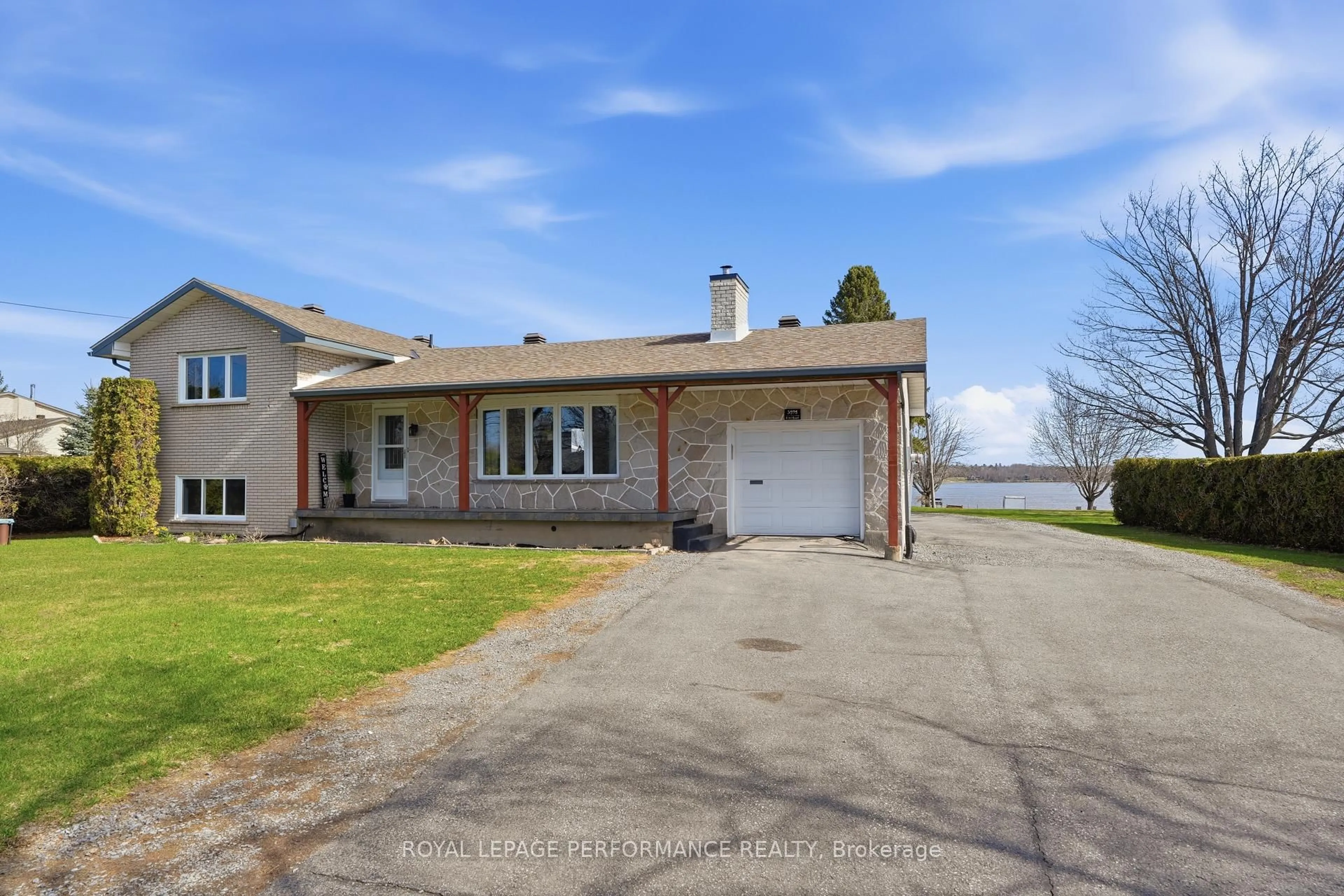 A pic from outside/outdoor area/front of a property/back of a property/a pic from drone, water/lake/river/ocean view for 3595 Front Rd, East Hawkesbury Ontario K6A 2W5