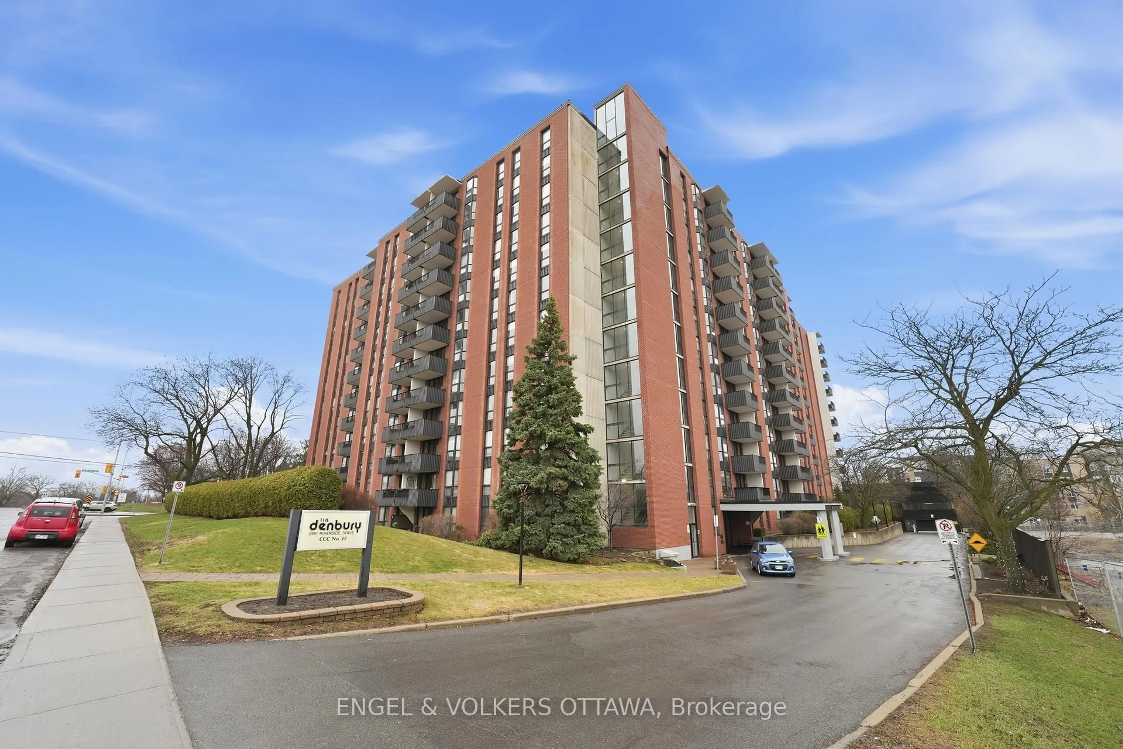 A pic from outside/outdoor area/front of a property/back of a property/a pic from drone, street for 2951 Riverside Dr #301, Ottawa Ontario K1V 8W6